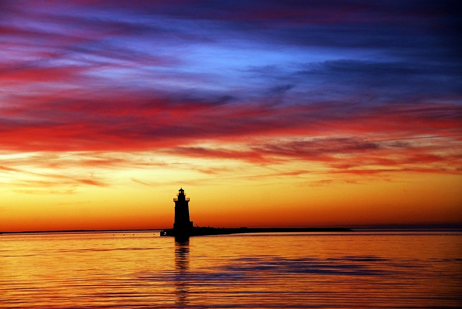 Delaware_Breakwater_East_End_Lighthouse_Sunset_Silhouette_Cape_Henlopen.jpg