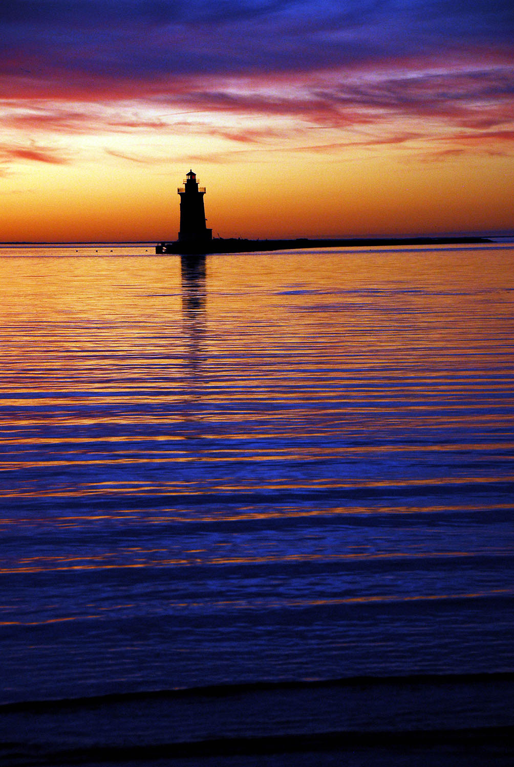 Delaware_Breakwater_East_End_Lighthouse_Sunset_Silhouette_Cape_Henlopen_Vertical.jpg