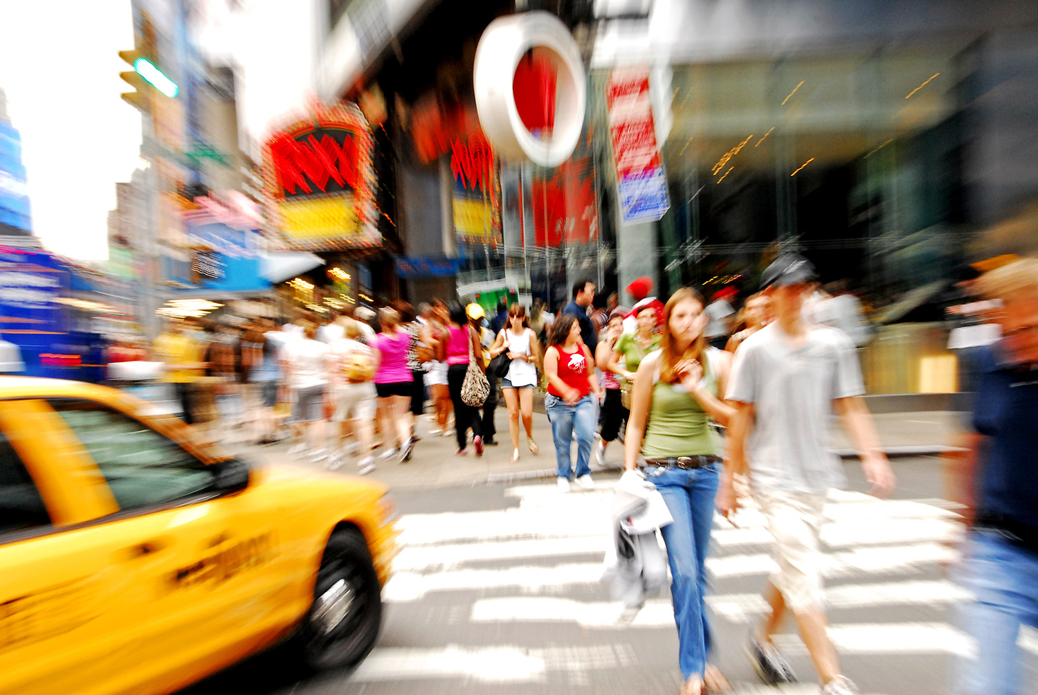 Times_Square_New_York_City_Tourism_Signs_Taxi_Cab_Pedestrians_Crosswalk_Blur.jpg