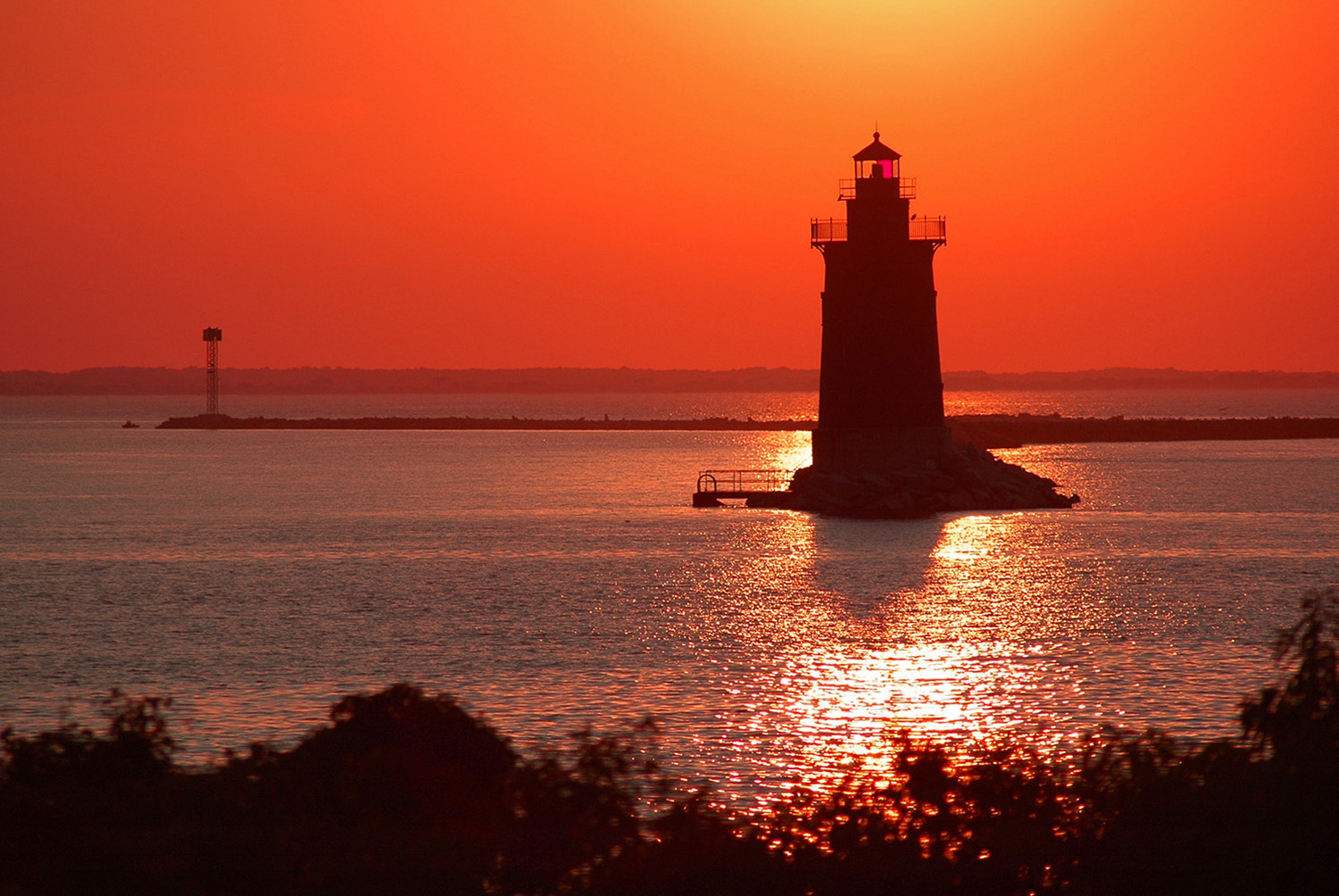 Delaware_Breakwater_East_End_Lighthouse_Silhouette_Sunset_Cape_Henlopen.jpg