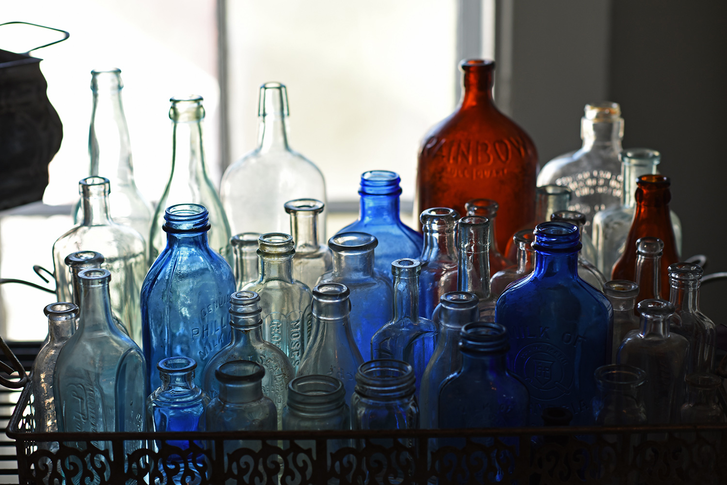 Antique_Medicine_Bottles_Collection_Blue_Window_Light.jpg