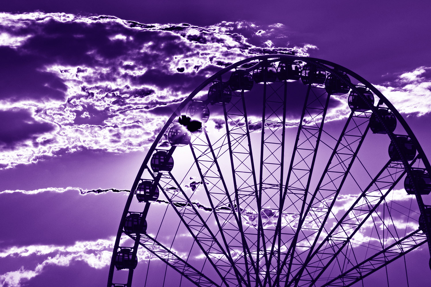 Ferris_Wheel,_National_Harbor_Sun_Clouds_Purple_Violet_Silhouette_Maryland.jpg