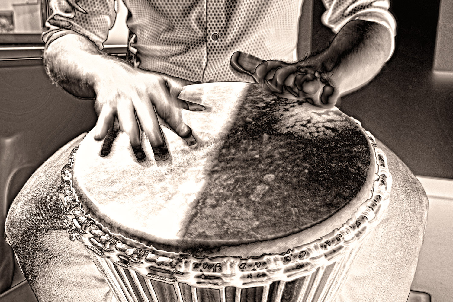 Musician_Drummer_Hand_Drum_Djembe_Percussion_Instrument_Blur_Monochrome_Sepia.jpg