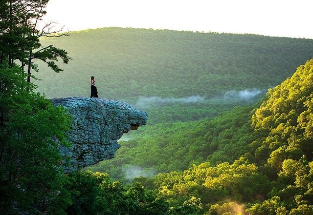 Blazing through the darkness of night, spiderwebs and a rain-soaked forest floor, we emerged to a stunning sunrise deep in the Arkansas Ozarks. The first rays illuminated the highest hilltops, the warming glow flooding into the hazy valley below. Low