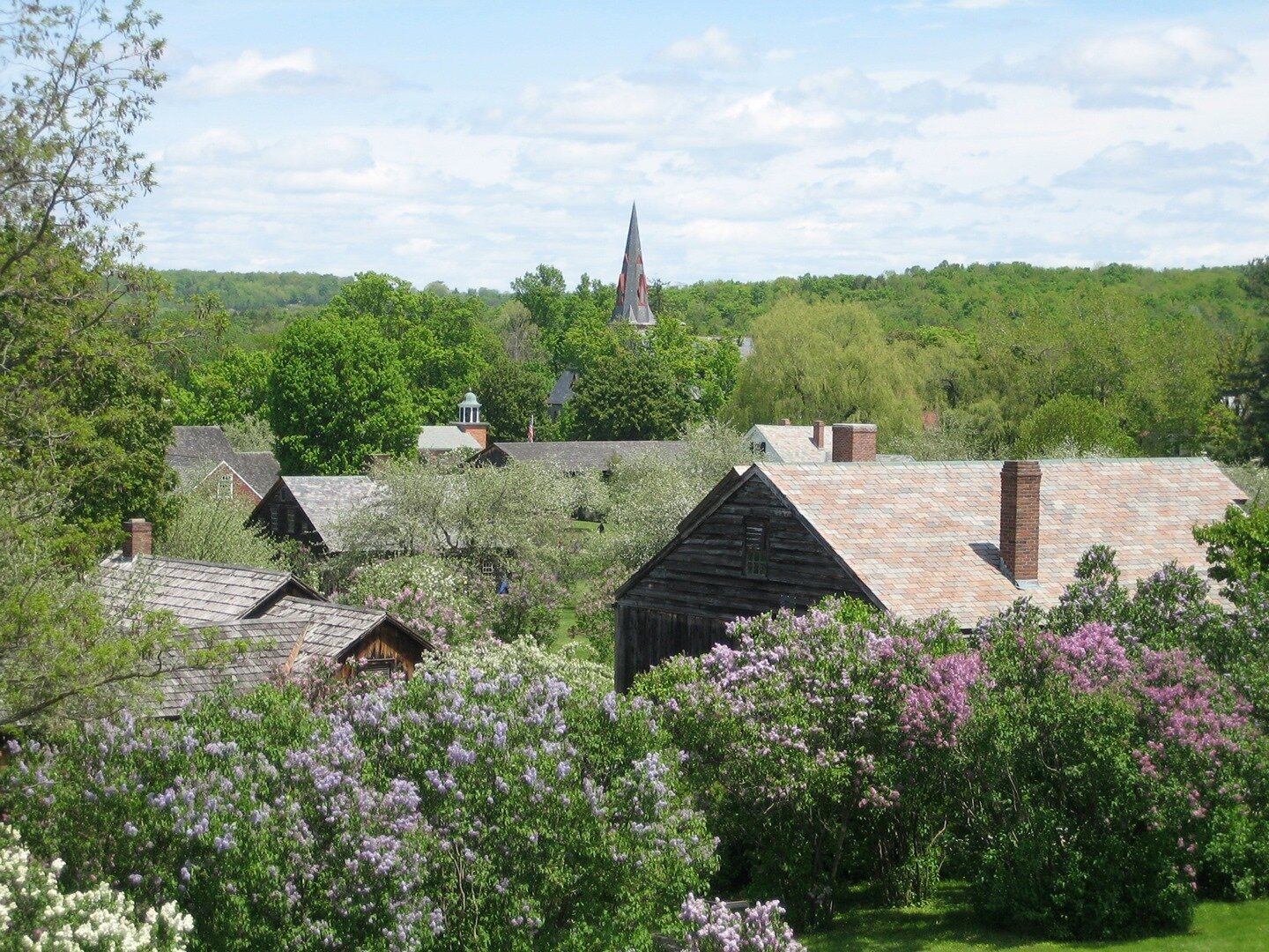 Rooftops of the Shelburne Museum during lilac season. Can't wait for warmer longer days ahead! Shelburne, VT.⁠
⁠
⁠
#historicpreservation #histpres #preservation #thisplacematters #architecture #history #oldhouse #oldhouselove #historichouse #vermont 