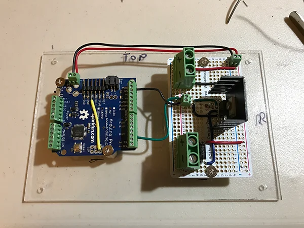 The electronics. The yellow wire on the Arduino is a bodge and unrelated to the functioning of the shower controller.