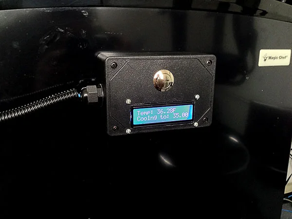 Control box, houses the Arduino and LCD. The button is used to set the temperature.