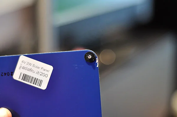 Rubber washer on the bolt to seal around the opening.
