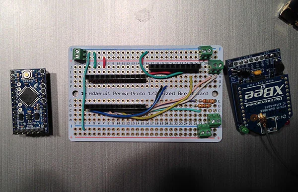 The Arduino and XBee were socketed to the protoboard so they are easily removable (this turned out to be very handy later). Screw terminals were used for all the wires that needed to connect to the board.