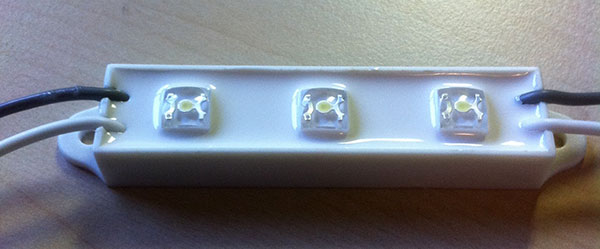 Dust and water tight LED modules. The three LEDs pull 25mA. Two modules were used per number.