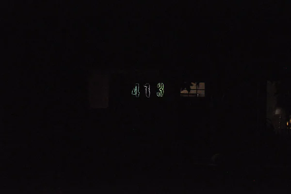 This is pretty close to how the numbers look. Note that I had turned our porch light off but even with it on the numbers are visible.