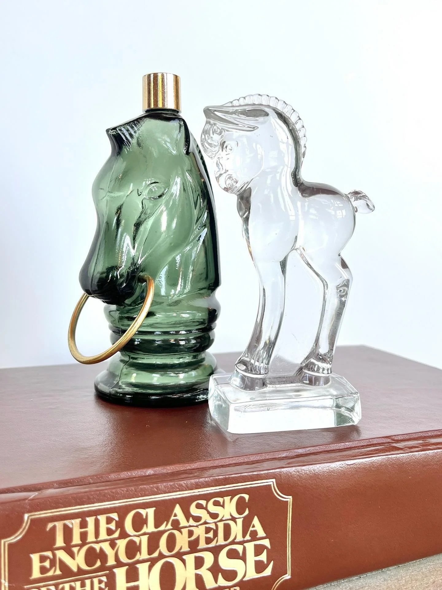 Vintage Heisey and Avon horse glassware. The Classic Encyclopedia of the Horse book. Available in my online shop - link in bio.
