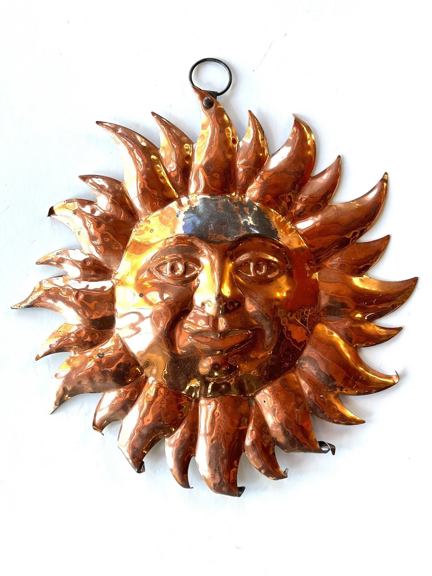 A cheery copper sun for your wall, inside or out! Available in my online shop - link in bio.