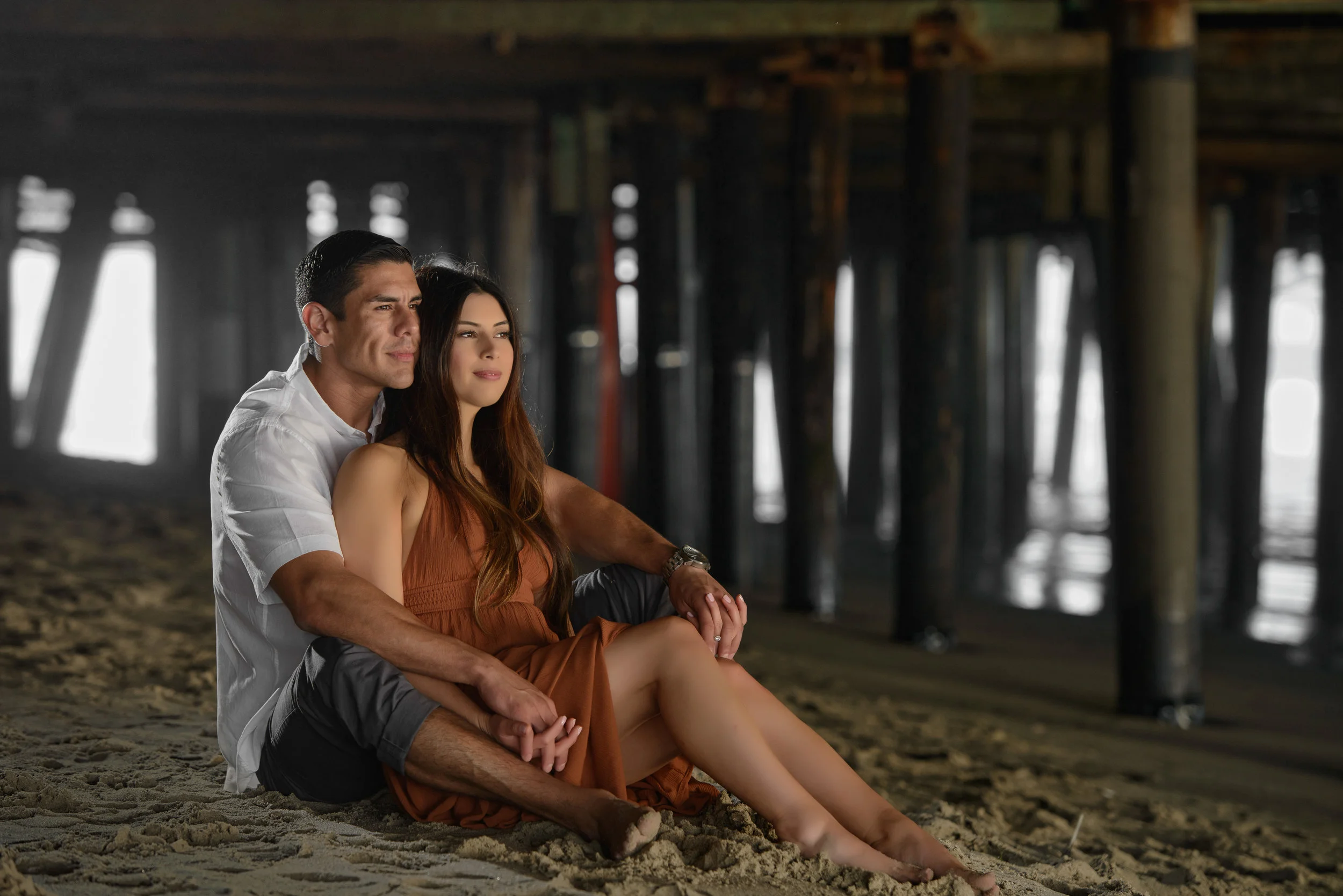 Beach Engagement Couple Underneath Santa Monica Pier