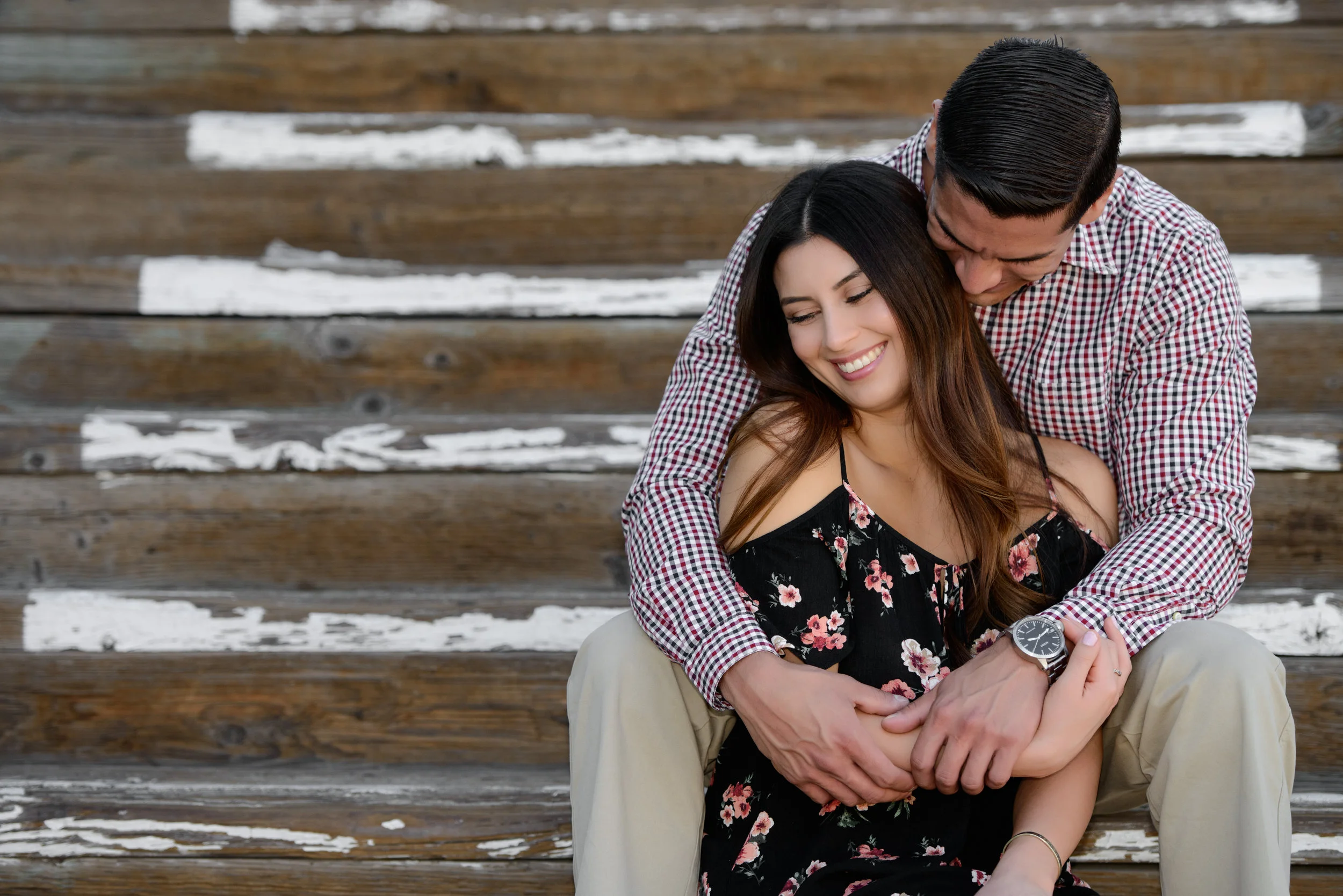 Beach Engagement couple at stairs in Santa Monica Pier