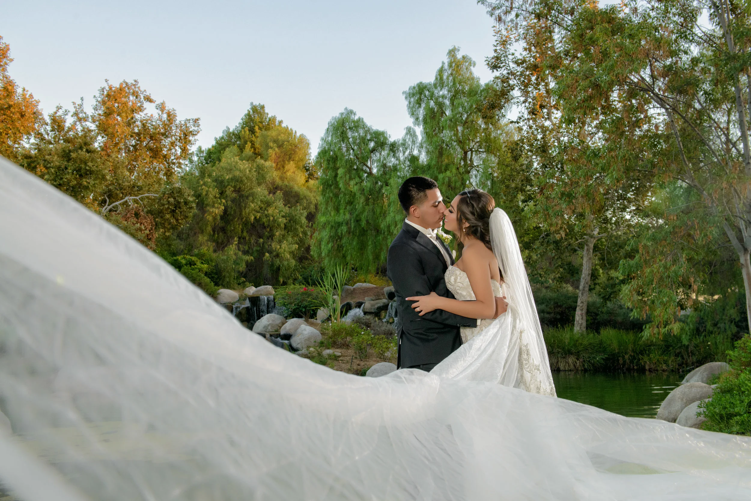 Bride And Groom With Veil at Coyote Hills In Fullerton