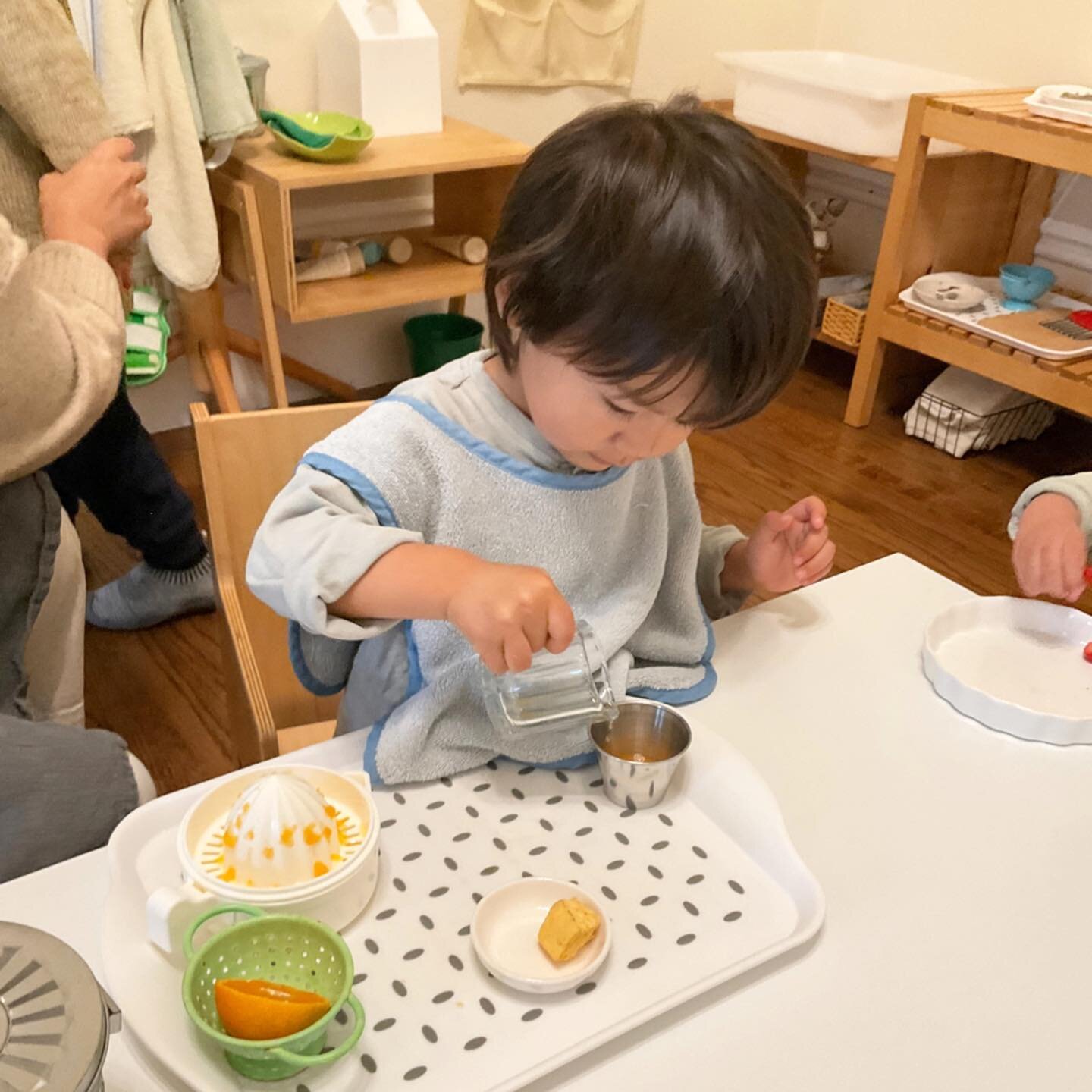 Orange Juicing🍊
As the mandarin season is here, we got a few fresh mandarins from the local farmers' market. Today, we introduced the orange juicing lesson for our children, and it was a hit!

This 23-month-old carefully poured the squeezed juice in