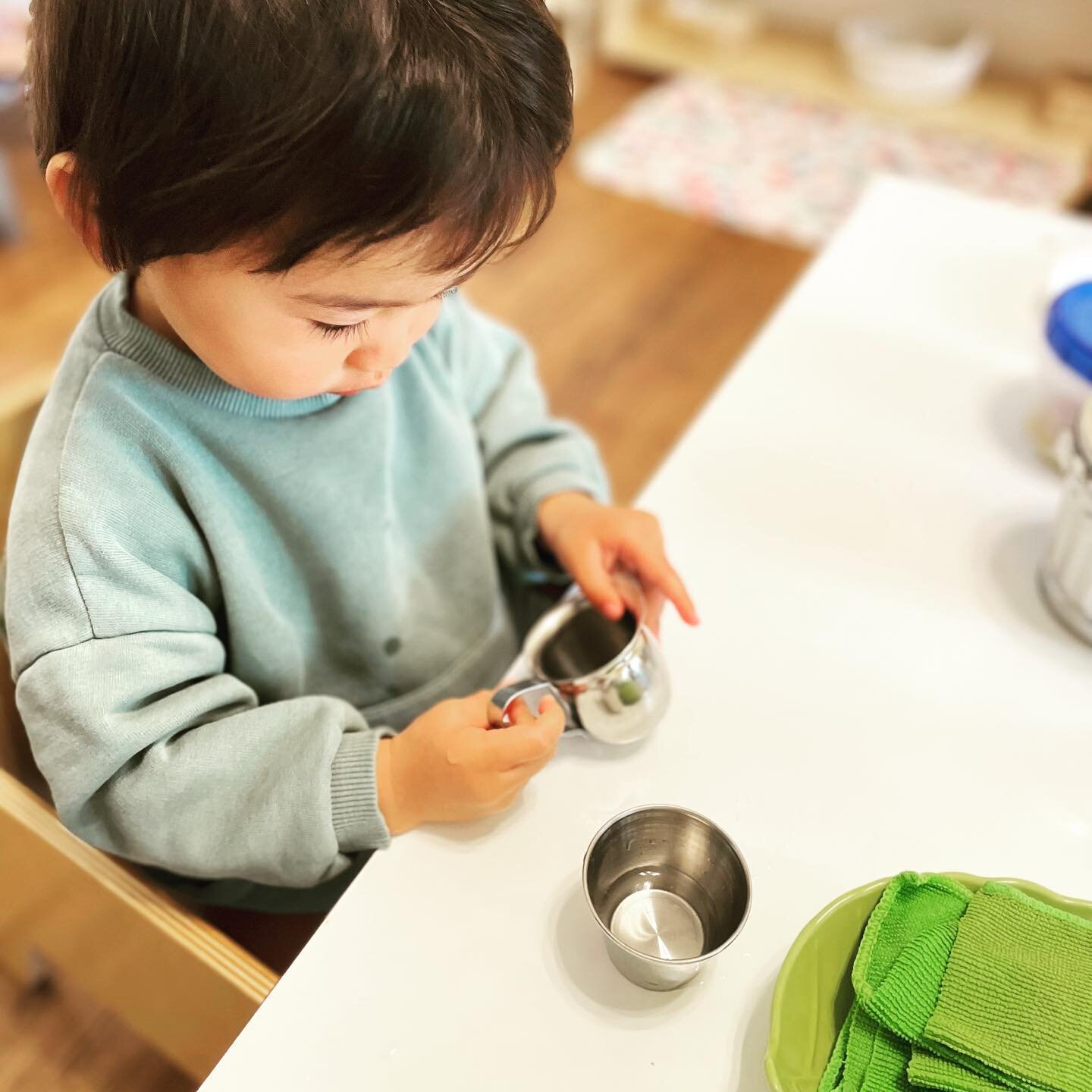 Pouring water into a cup🫗is one of the most significant milestones in our program. A child carefully and gracefully bring a cup and a pitcher to the table and pours water into a cup. It sounds straightforward, but this one sequence of movements requ