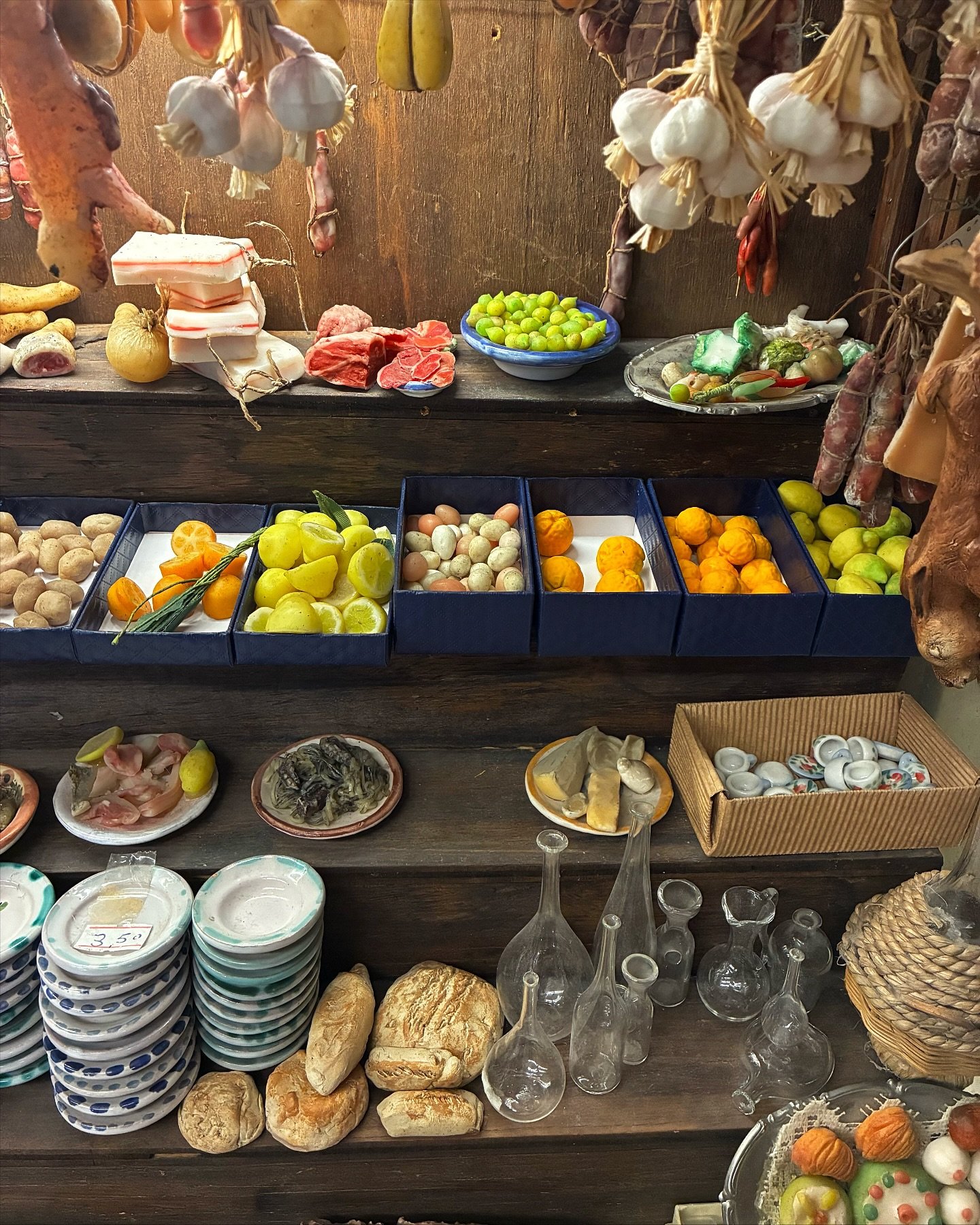 Getting lost in the wondrous world of Neapolitan nativity scenes &hellip; glazed ceramic plates the size of coins, displaying any prepared dish imaginable, intricately fragile glass carafes waiting to be filled with wine, espresso cups smaller than a