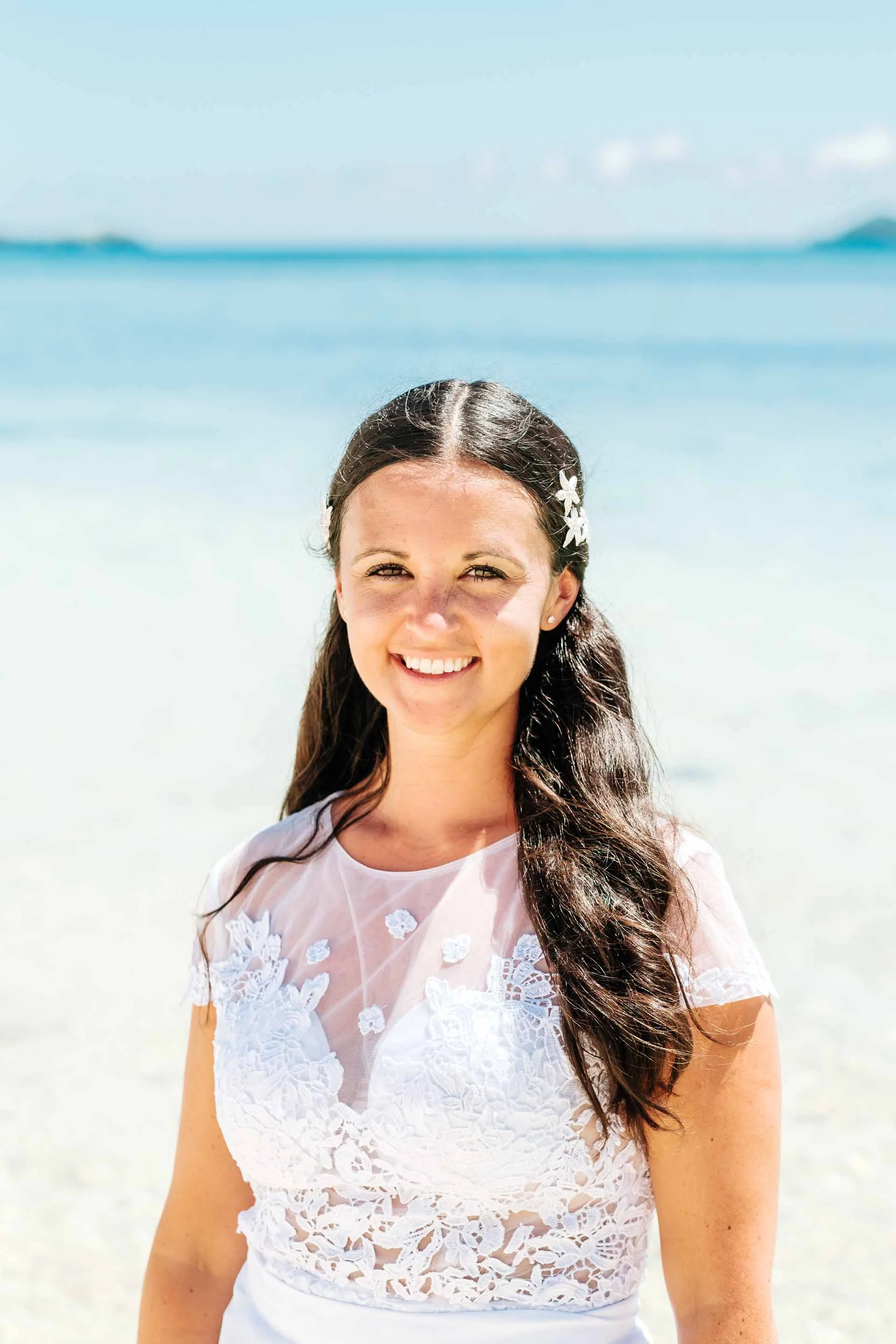 a portrait of the bride on the beach