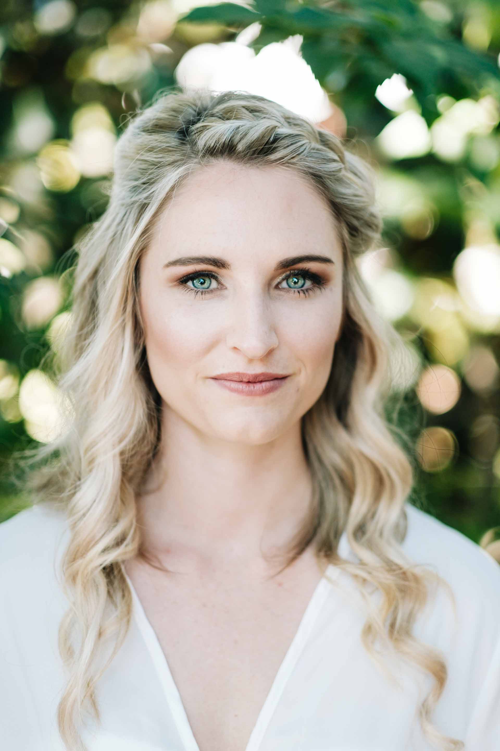 a close portrait of the bride in her wedding robe