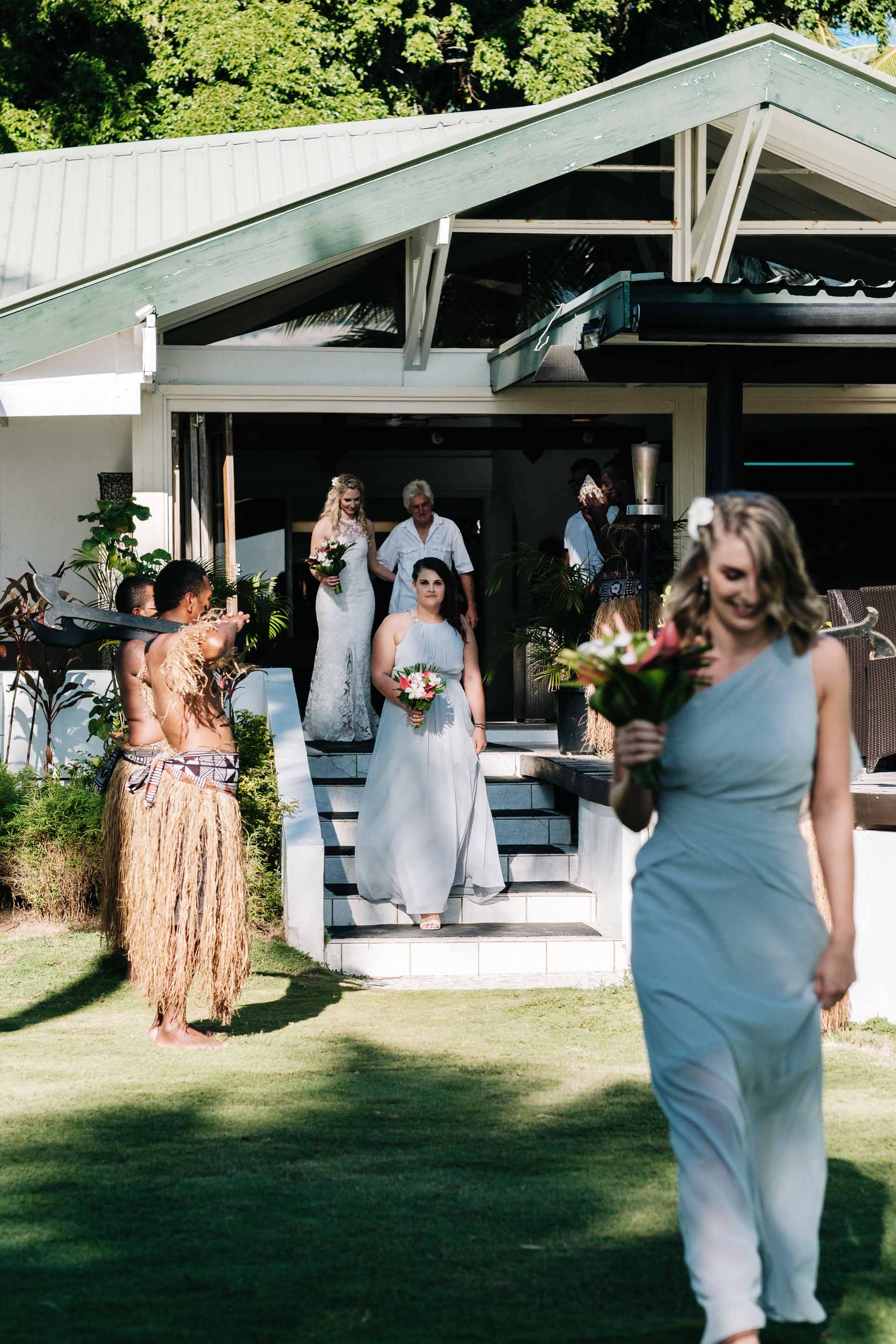 bridesmaids walking down the aisle