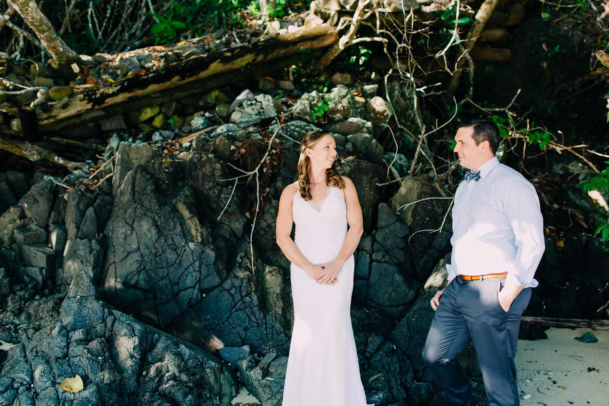 Bride and Groom relax on the beach ready for their Fiji wedding in the middle of the ocean.