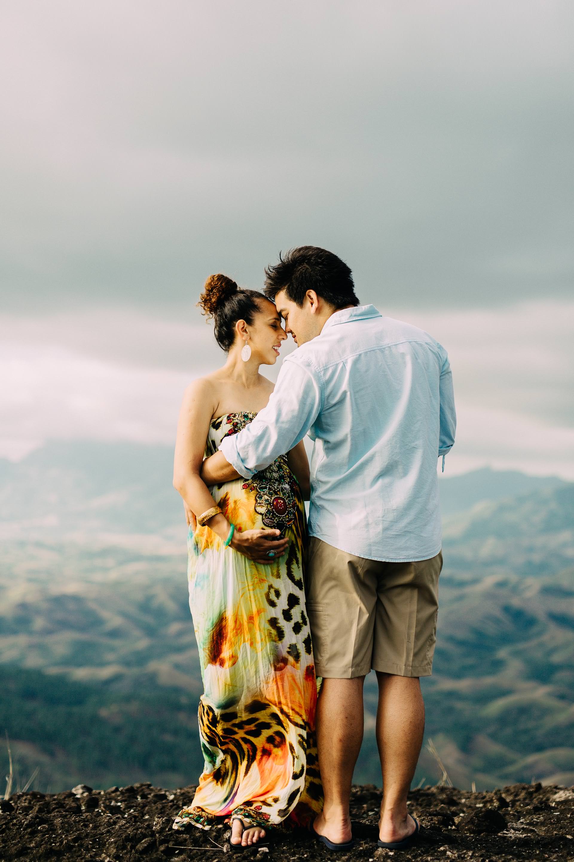 a touching moment during the engagement session