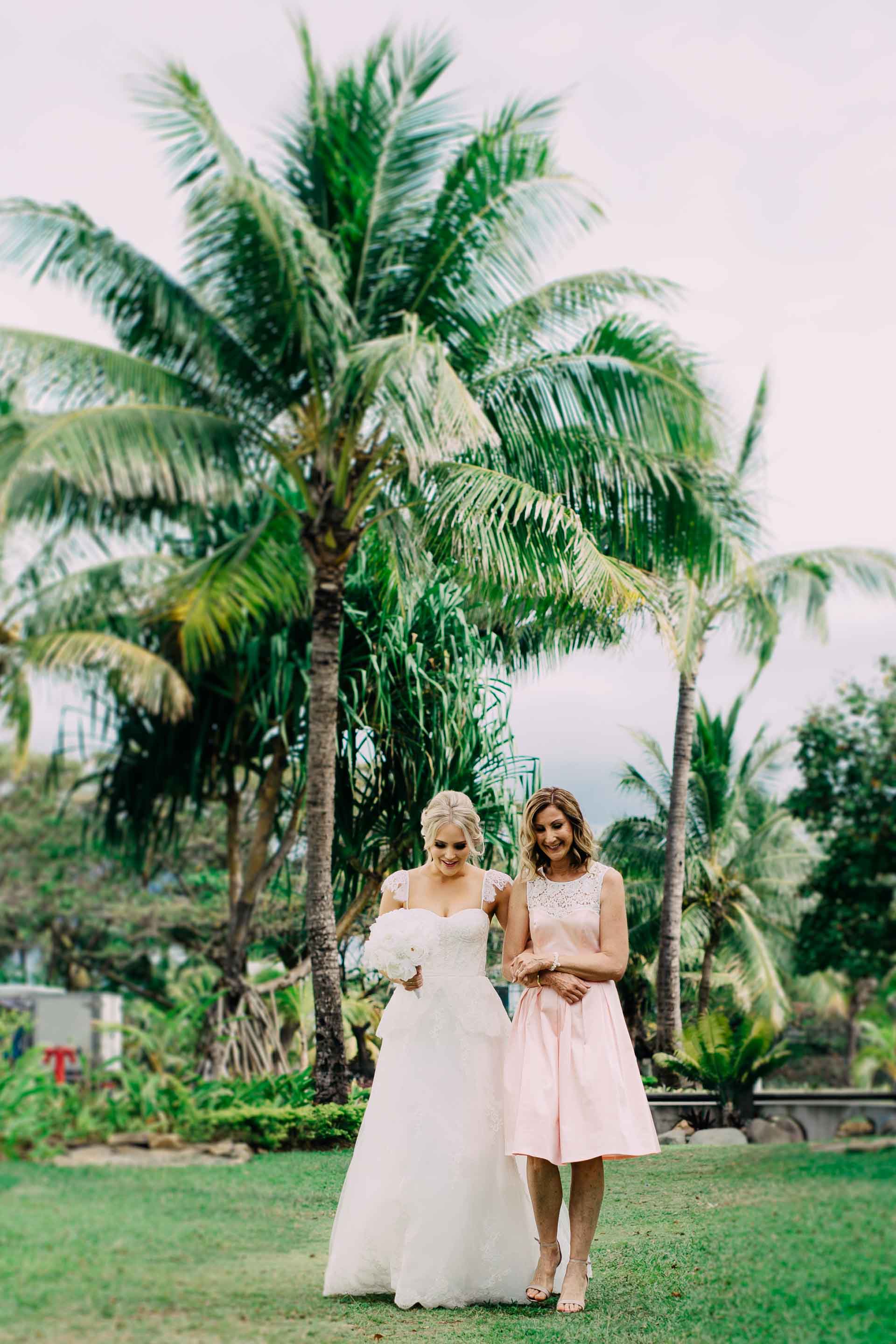 Mother of the Bride walks the Fiji Bride down the aisle to get married in paradise at the Hilton.