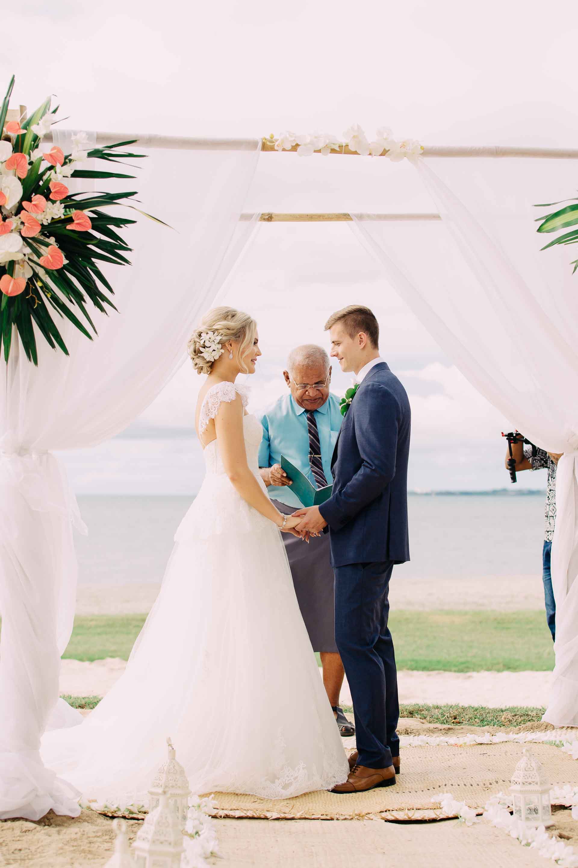 Beautiful beach marriage ceremony with a celebrant to officiate the union.