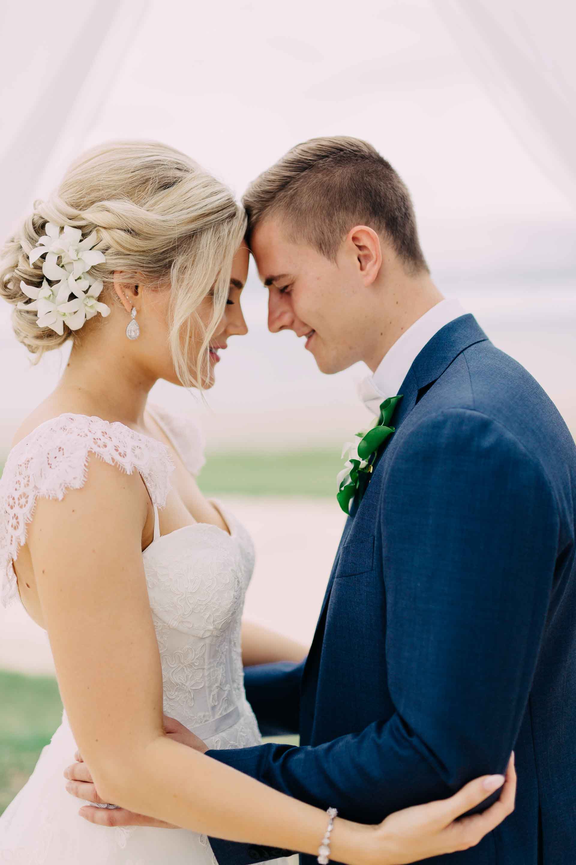 Husband and wife hug and enjoy the moment.