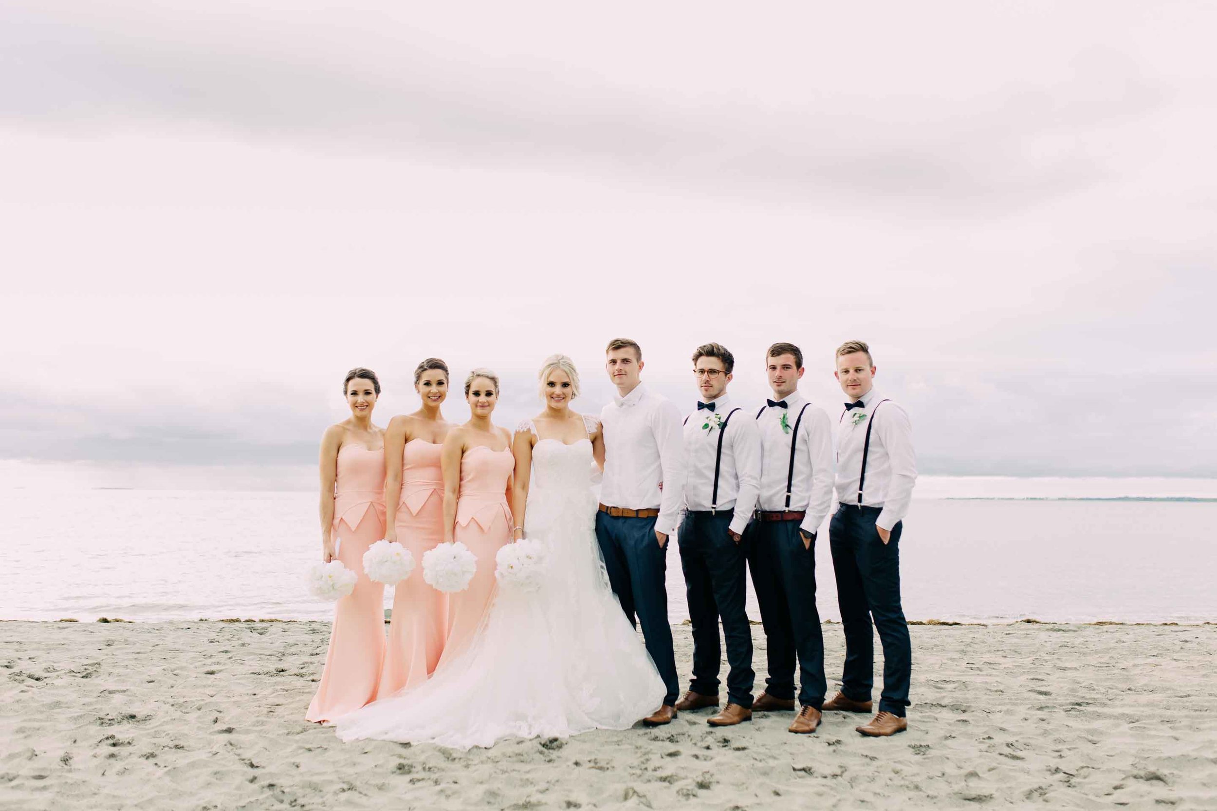 Stylish Bridal Party on the beach Hilton Fiji. 