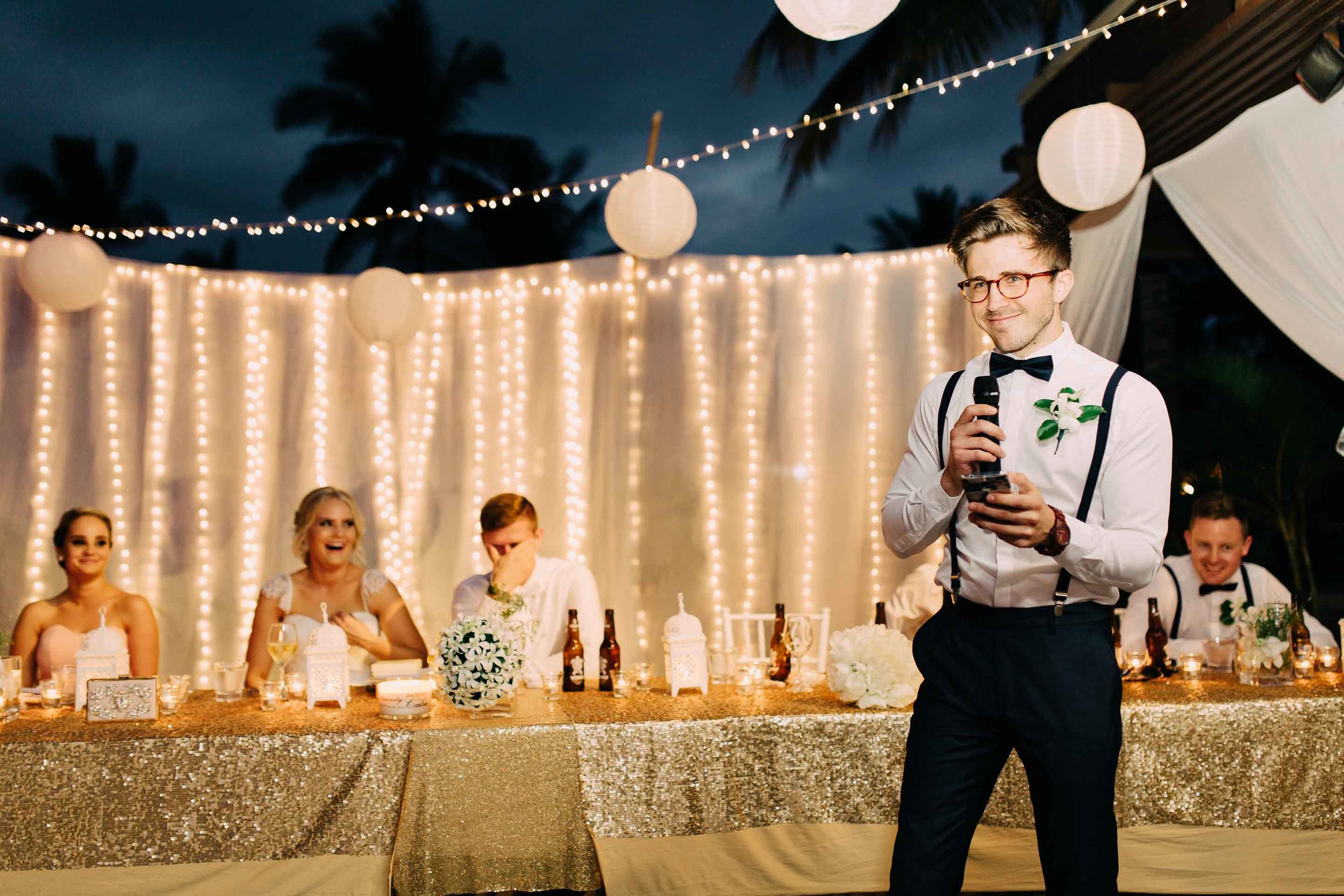 Beautiful white and golden themed Fiji wedding reception set up decorations decor warm white fairy lights at the Hilton.