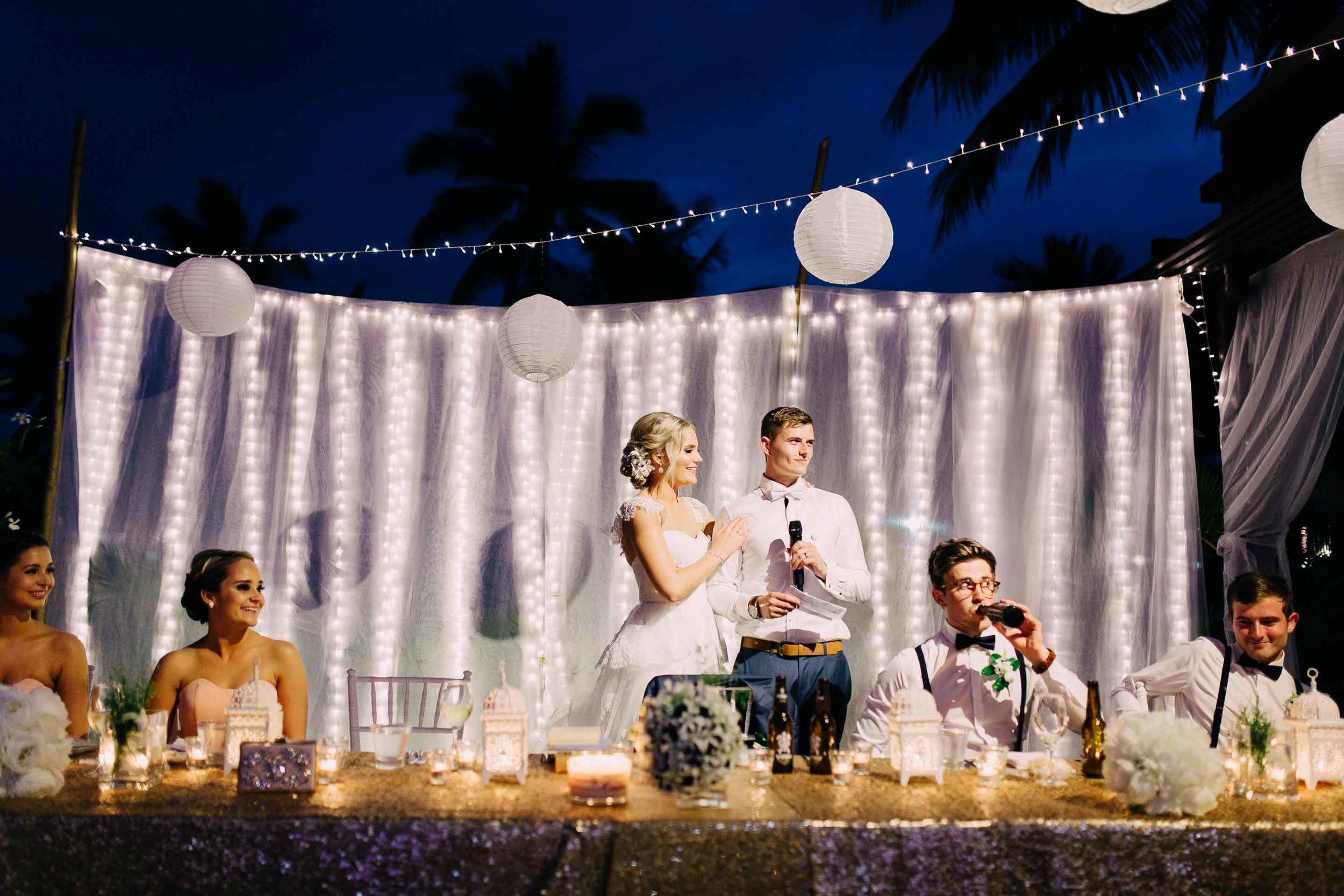 Beautiful white and golden themed Fiji wedding reception set up decorations decor warm white fairy lights at the Hilton