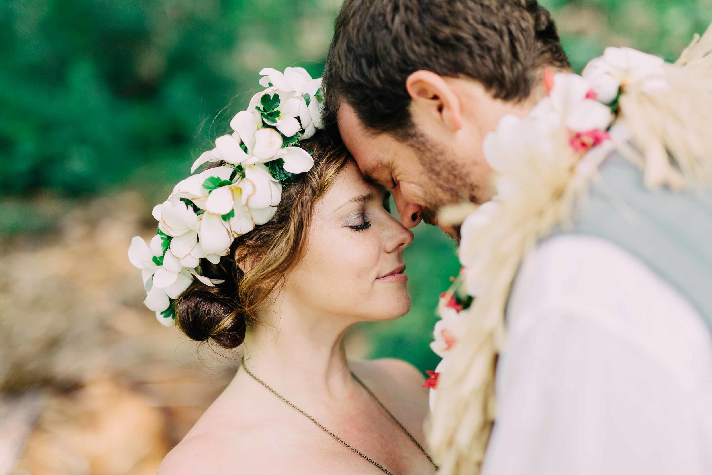 A closeup of the couple in the gardens of Yasawa Island Resort