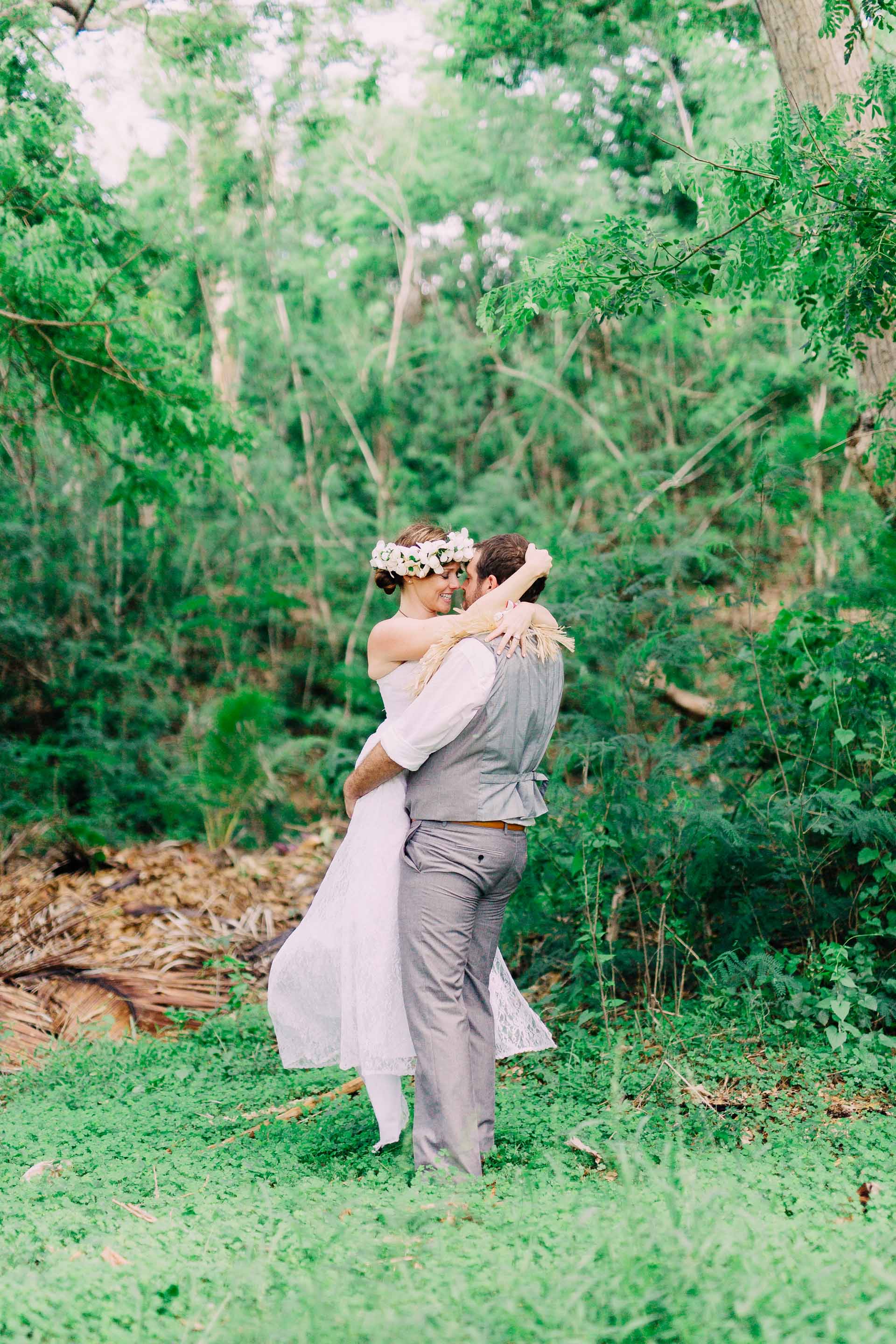 the groom carrying the bride