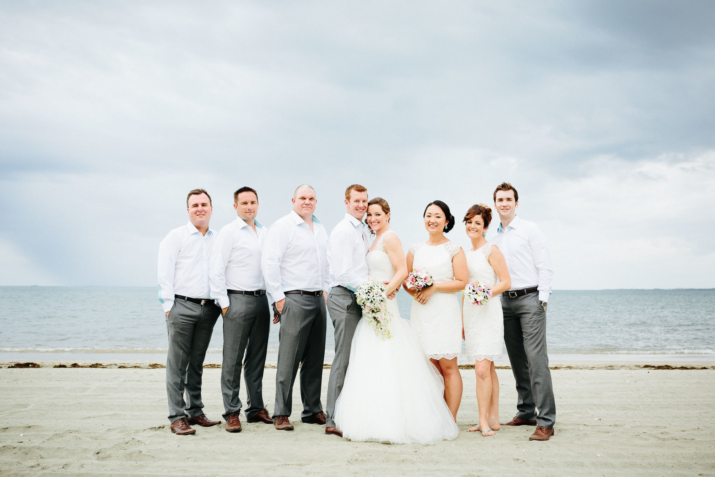 bridal party on the beach