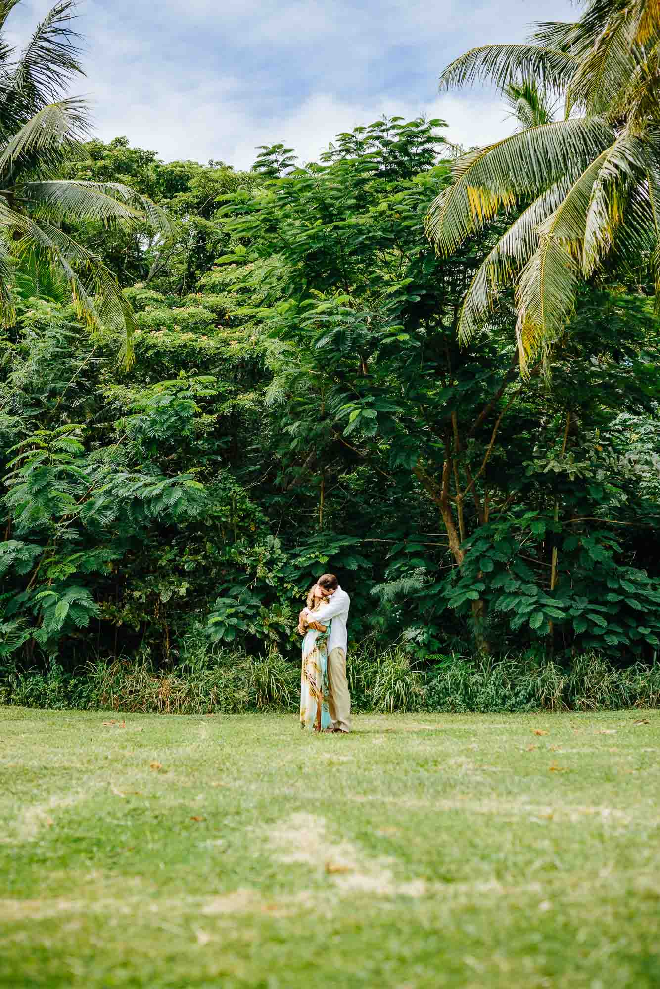 Couple posing in garden