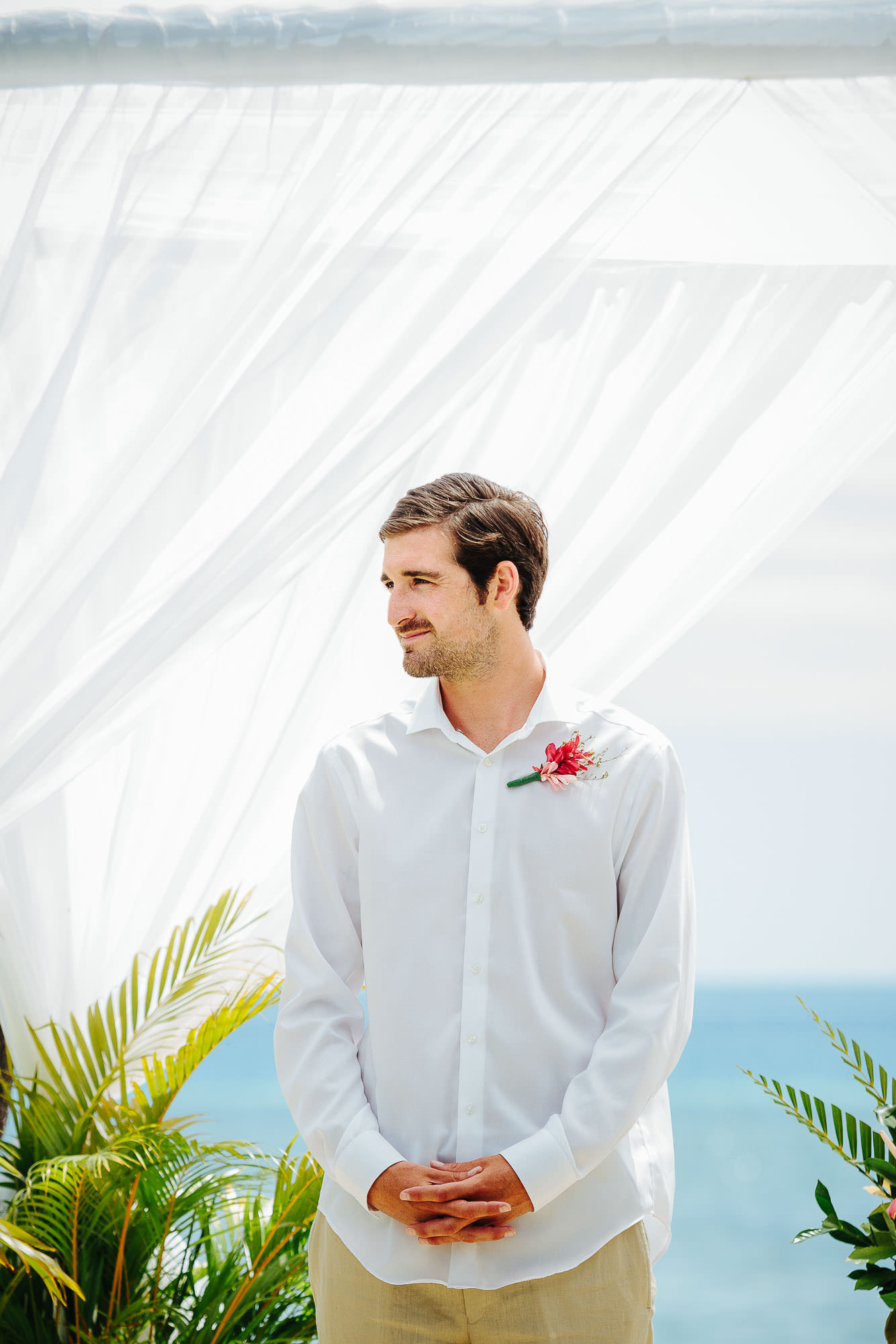 groom waiting for bride at alter