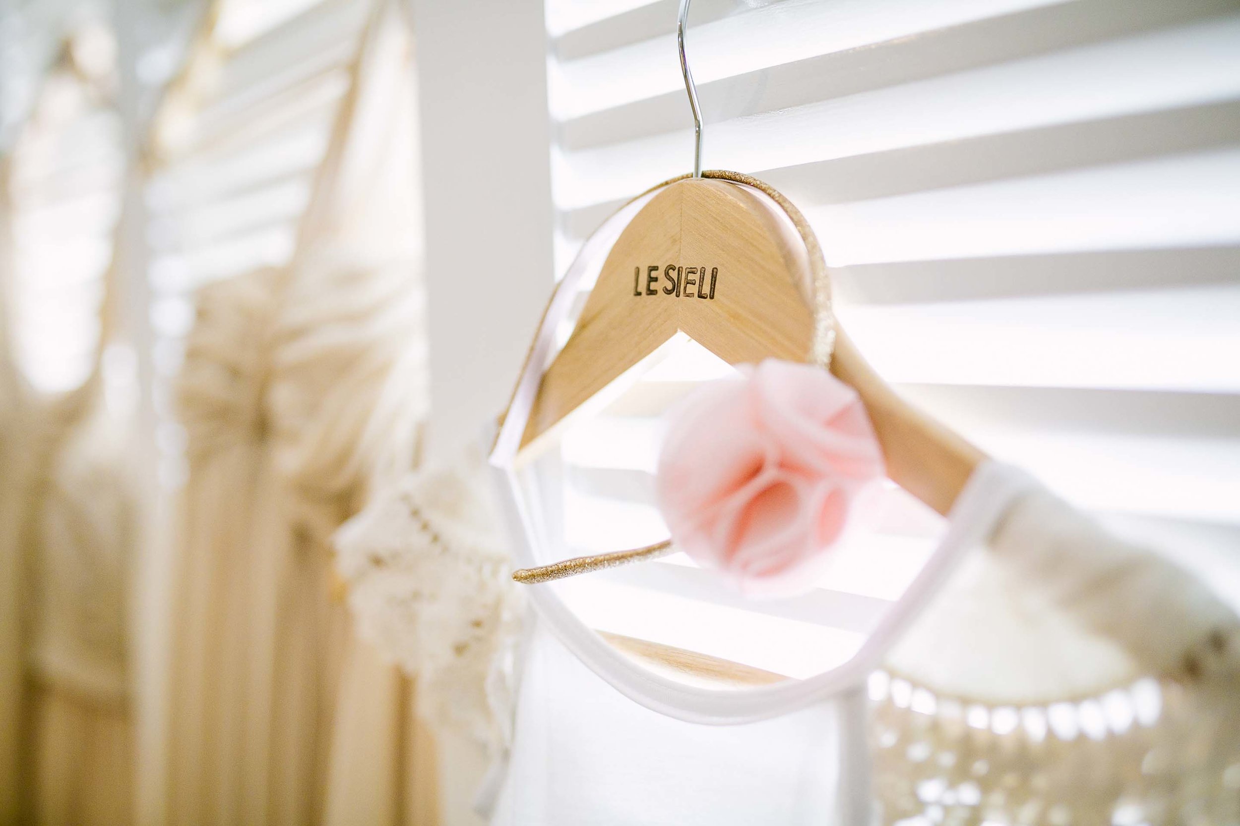 custom clothes hanger for the bride and bridesmaids dresess