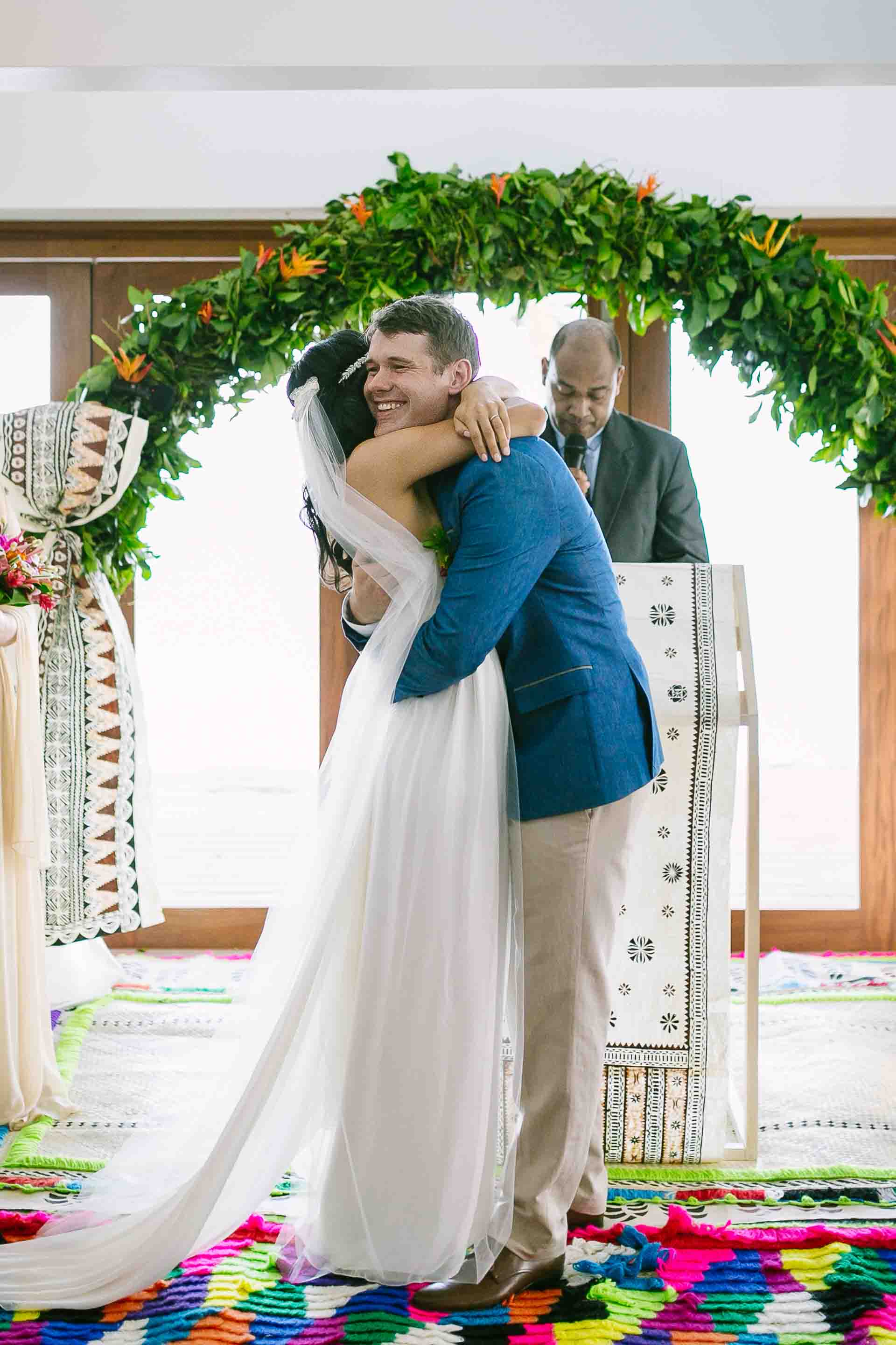 the couple hug after being declared man and wife