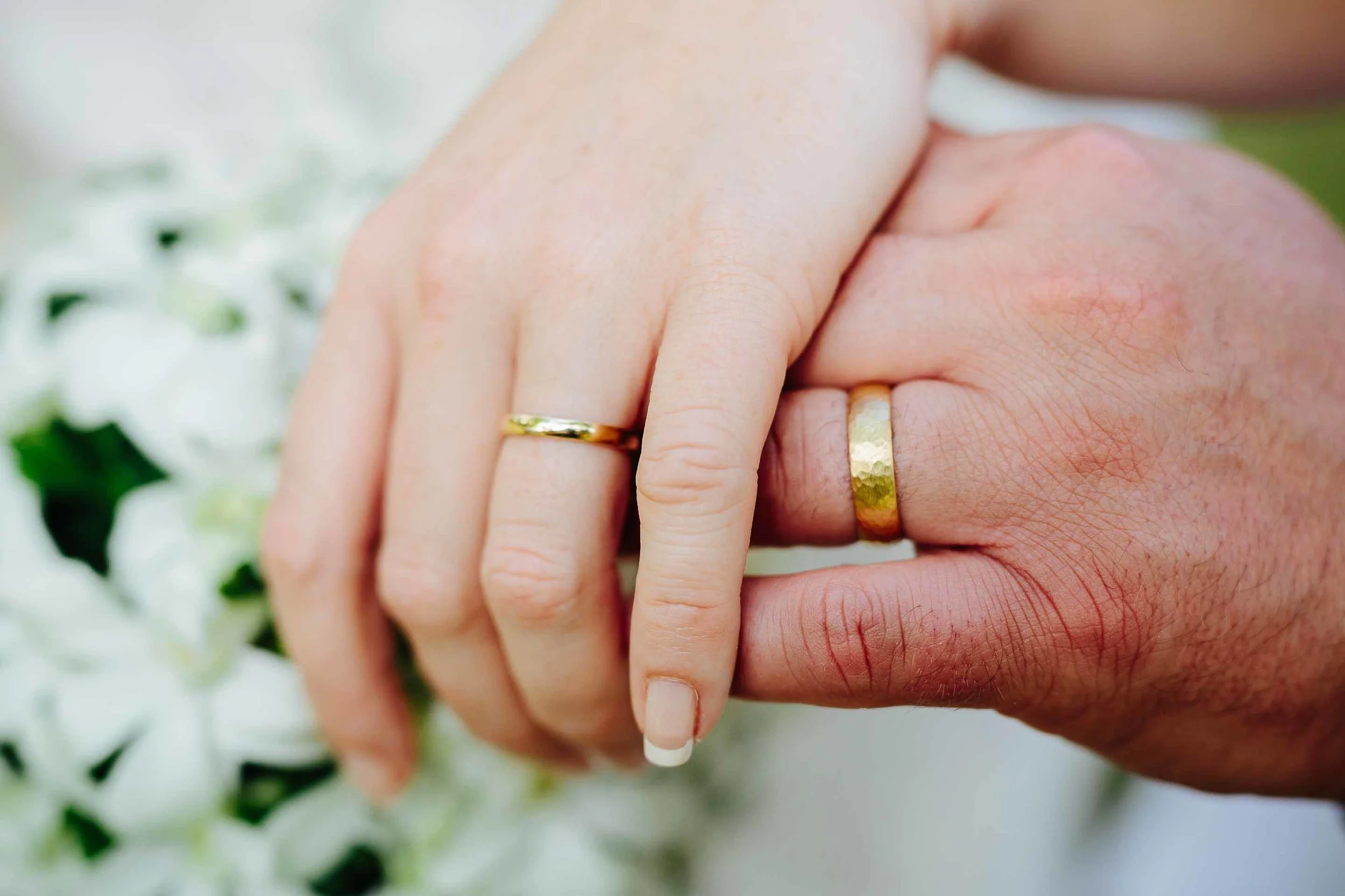 the couple holding hands