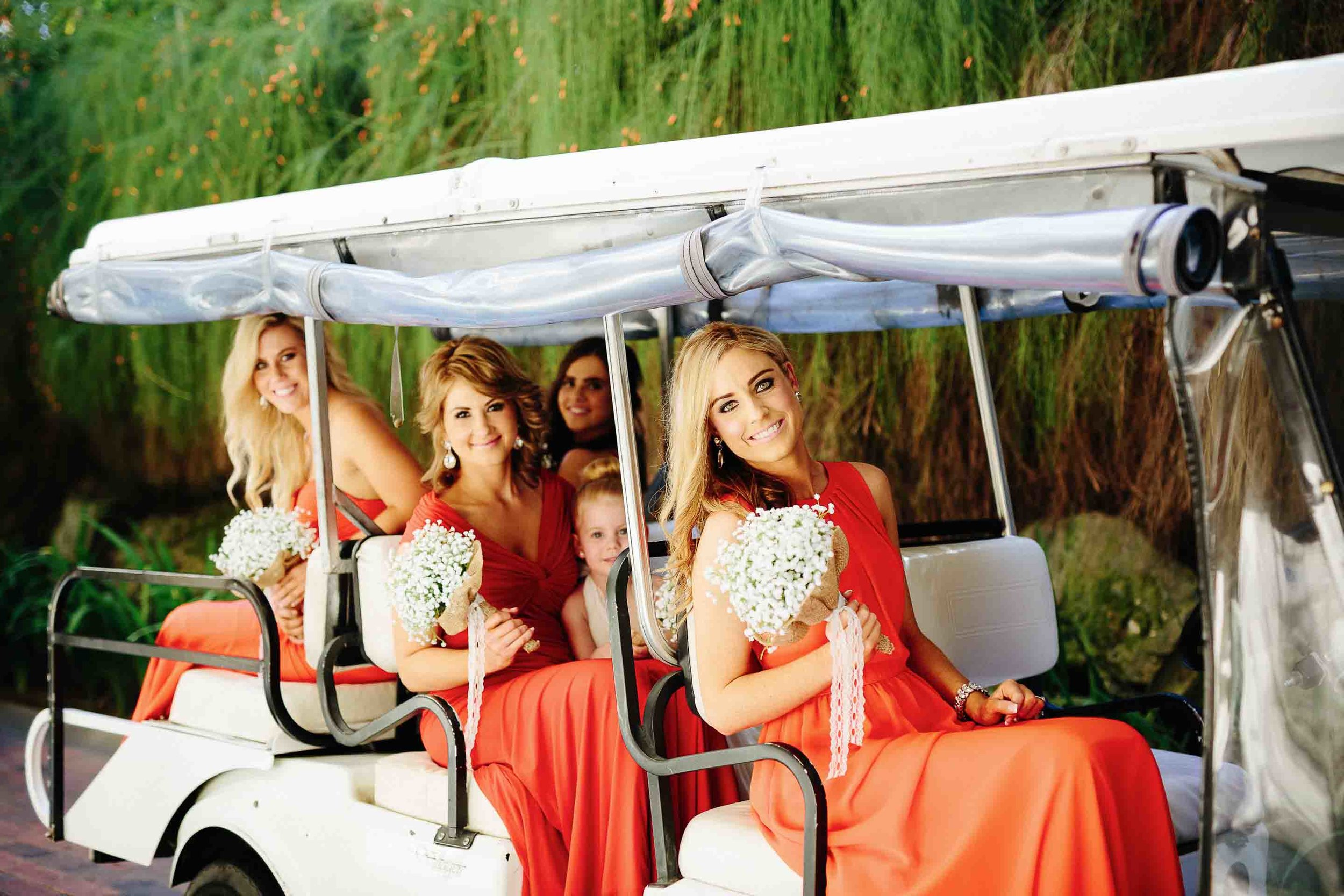 bridesmaids in the buggy leaving for the chapel