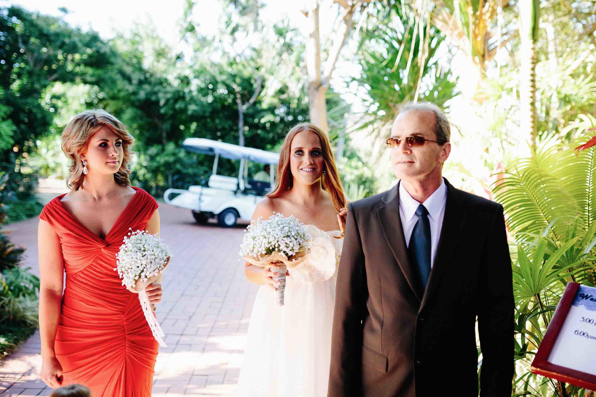 bride and her father before walking down the asile