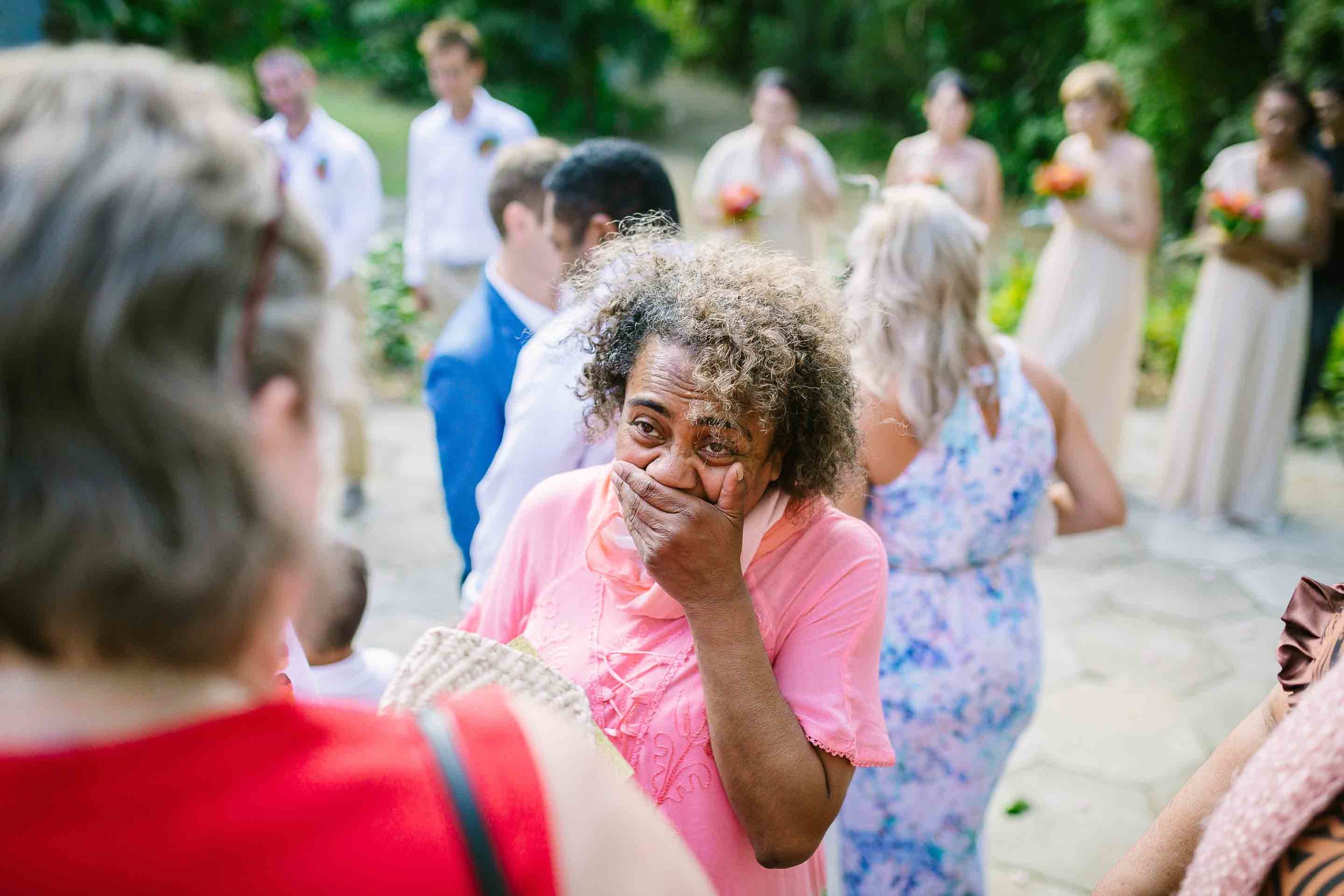 emotional guests waiting to congratulate the couple