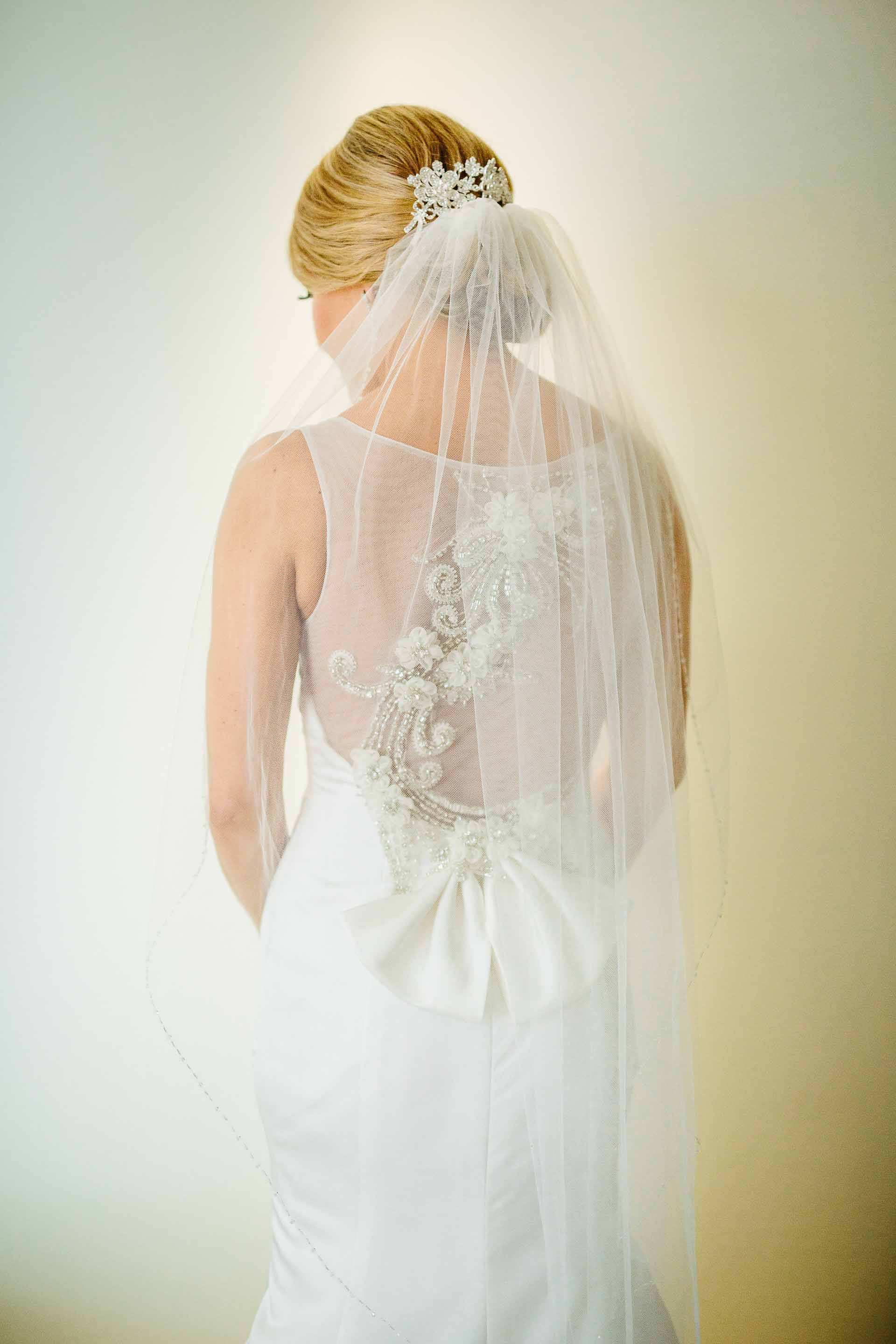 bride posing before leaving for the ceremony