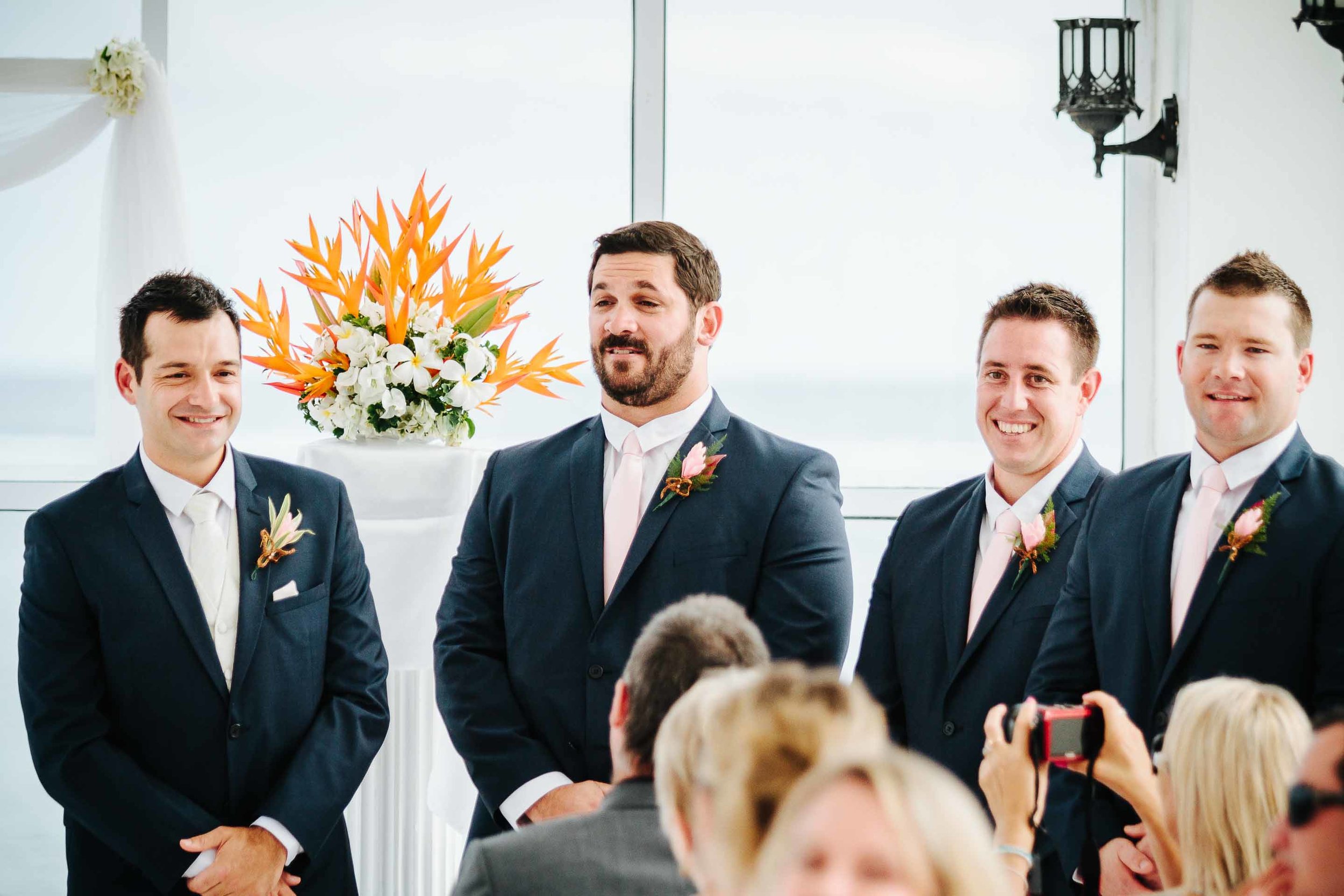 groomsmen waiting for bride