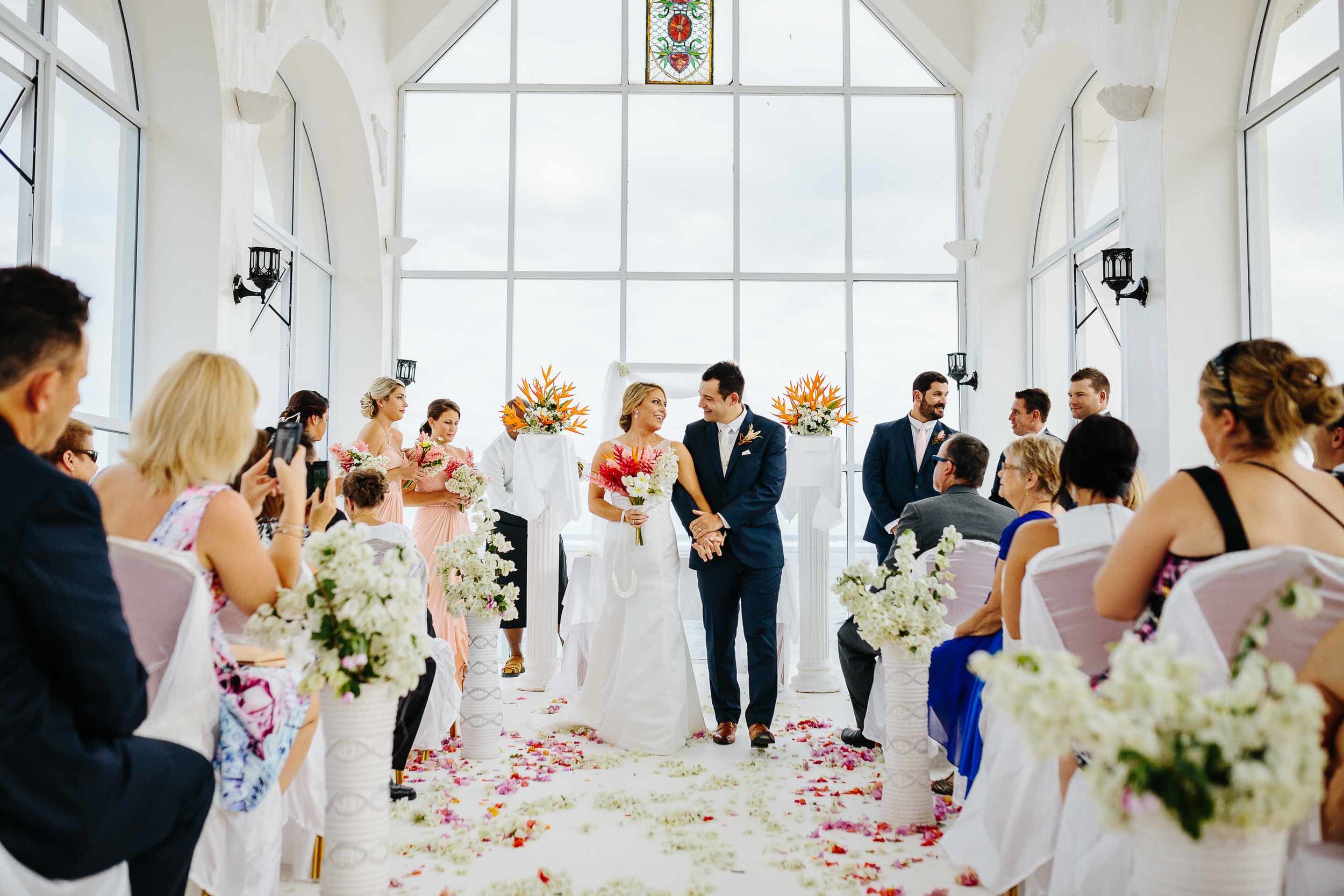 the happy couple leaving the chapel