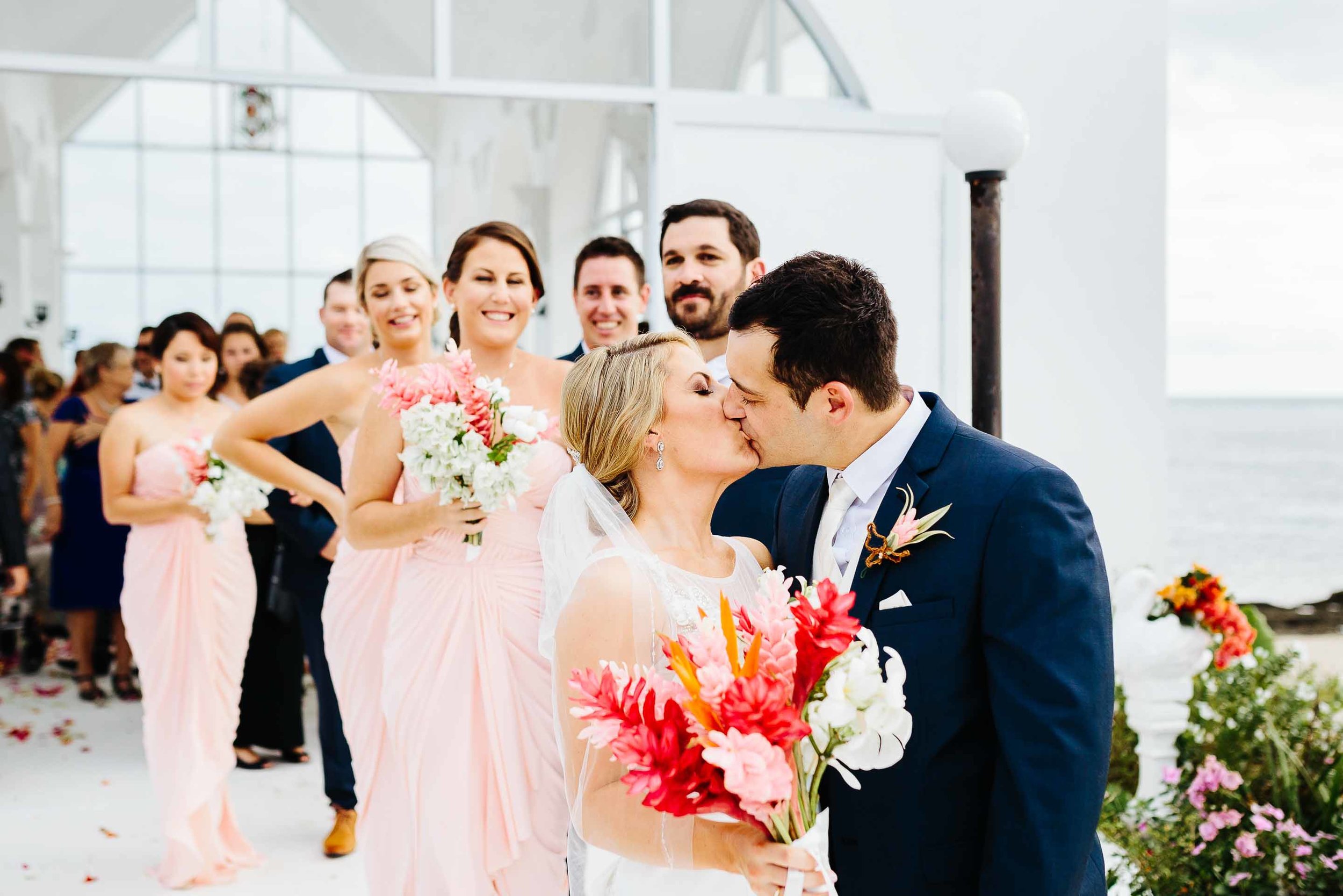 couple kissing outside the chapel