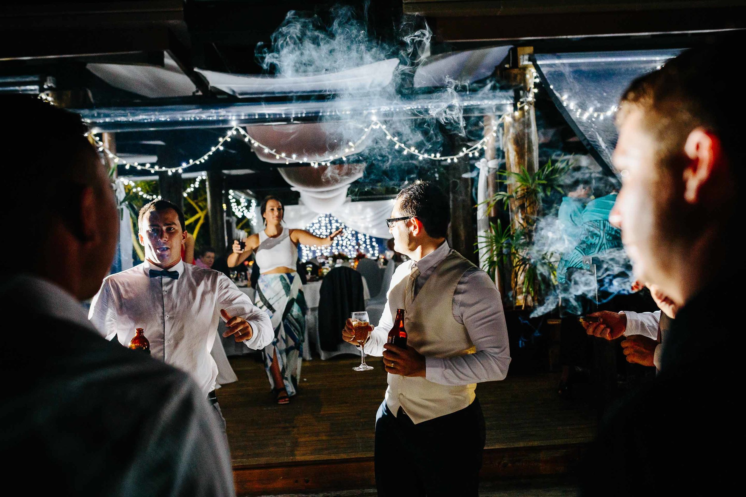 groomsmen smoking cigars